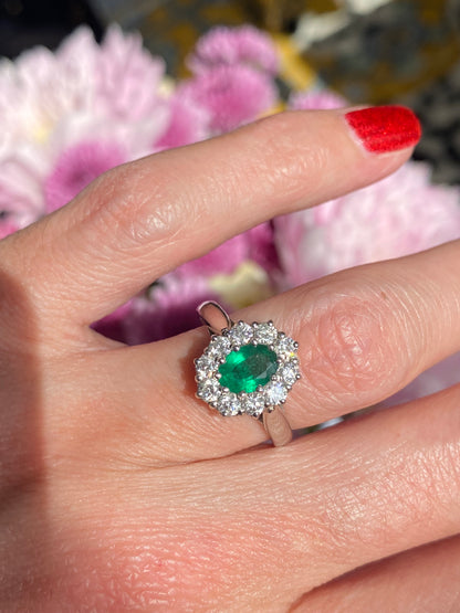 0.60 Carat Emerald and 0.66 ctw Natural Diamond Halo Engagement Ring in Platinum