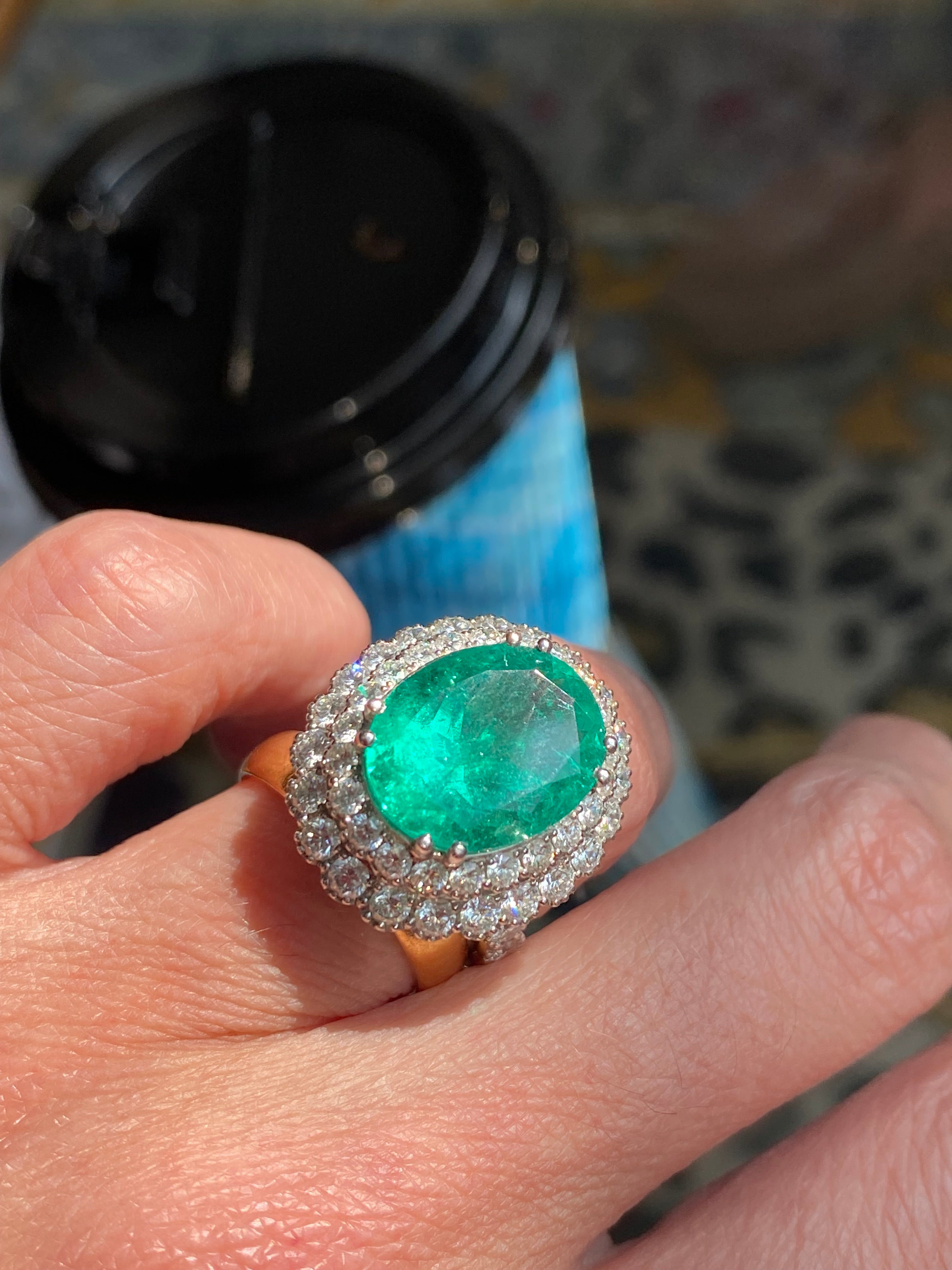 9.10 CTW Colombian Emerald and Natural Diamond Double Halo Ring in Platinum