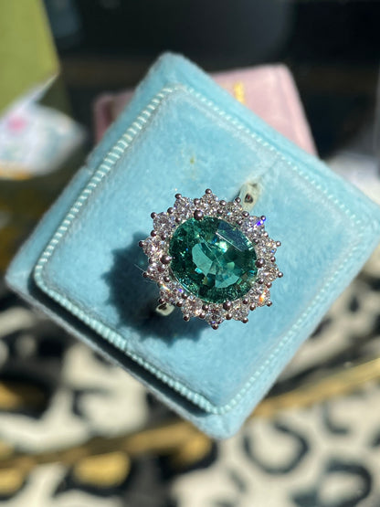 3.06 Carat Blue Tourmaline and Natural Diamond Halo Ring in Platinum and 18ct Yellow Gold