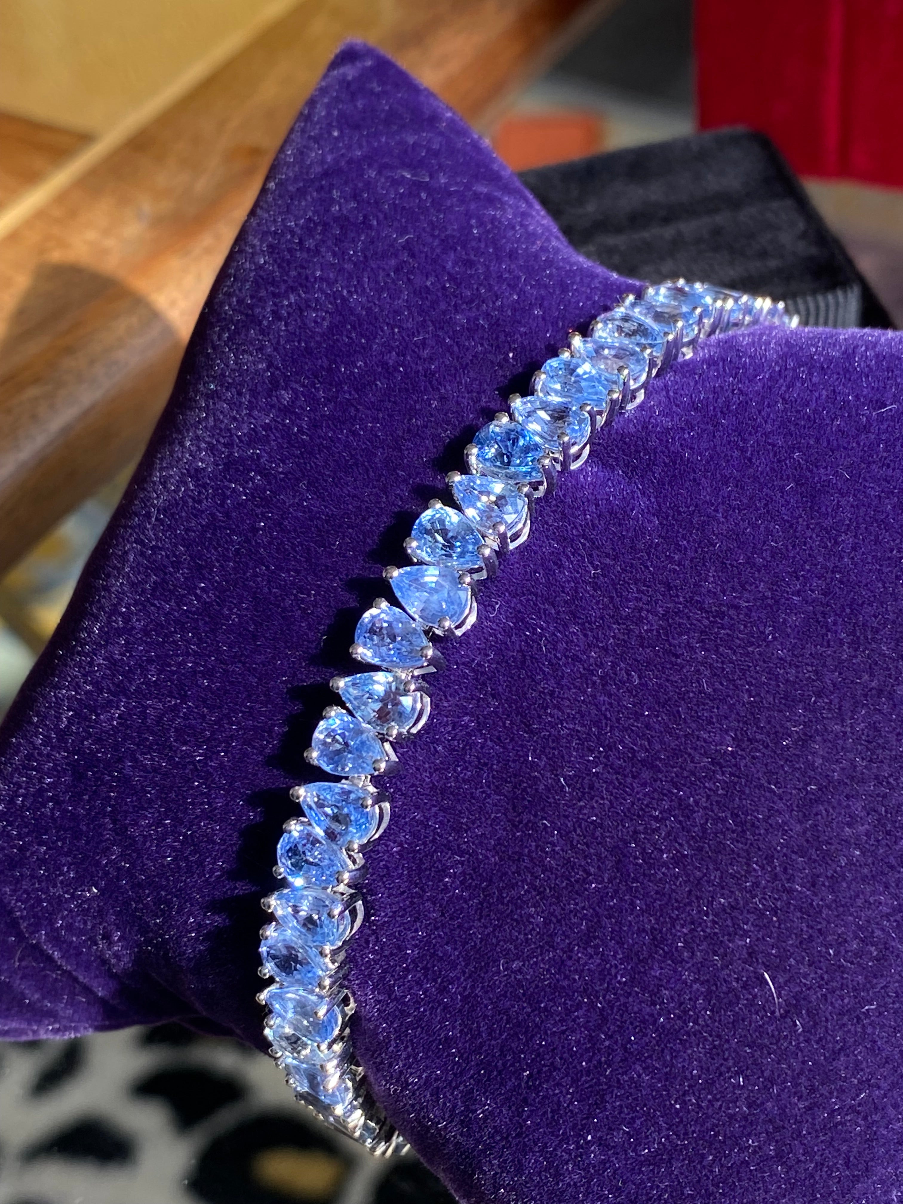 27.08 CTW Pear Cut Ceylon Sapphire Line Bracelet in 9ct White Gold