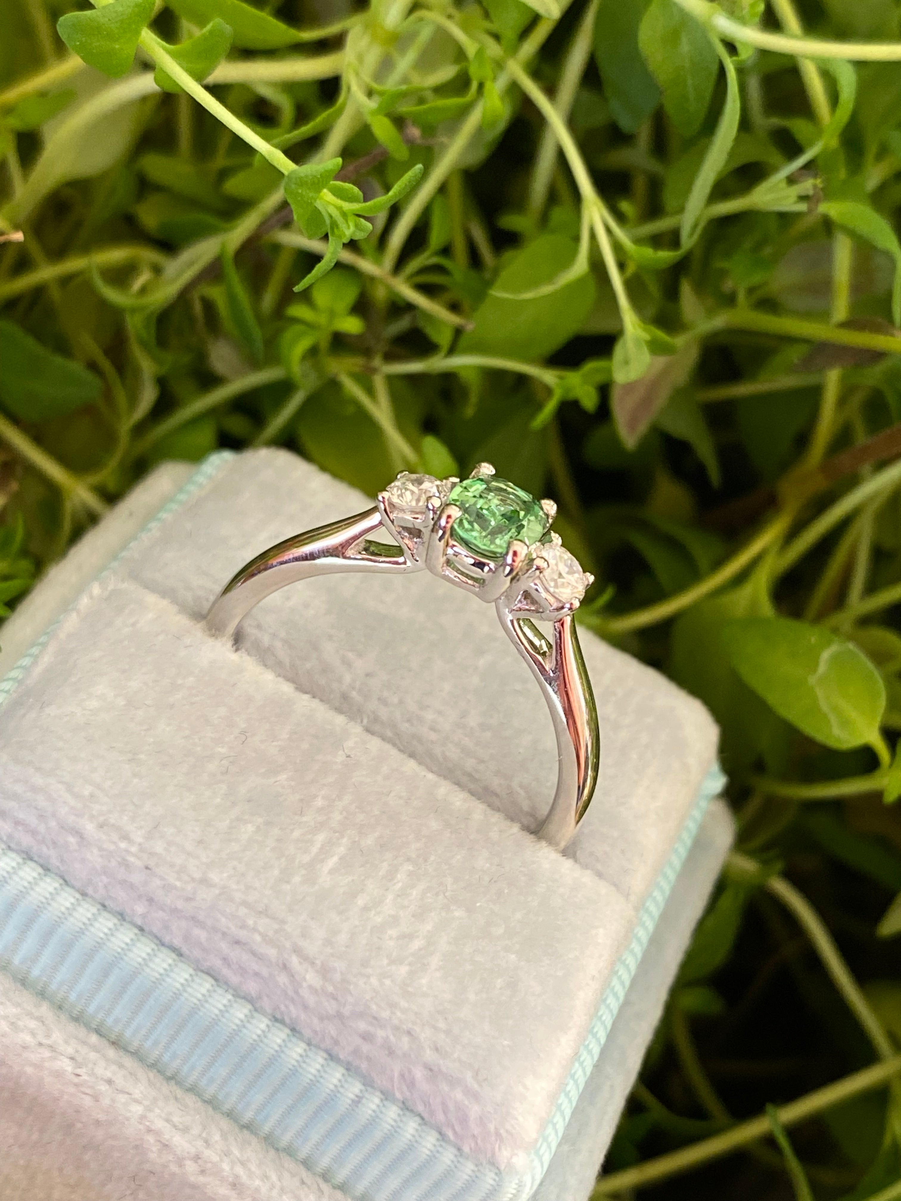 0.40 Carat Tsavorite Garnet and 0.20 Carat Diamond Three Stone Engagement Ring in Platinum