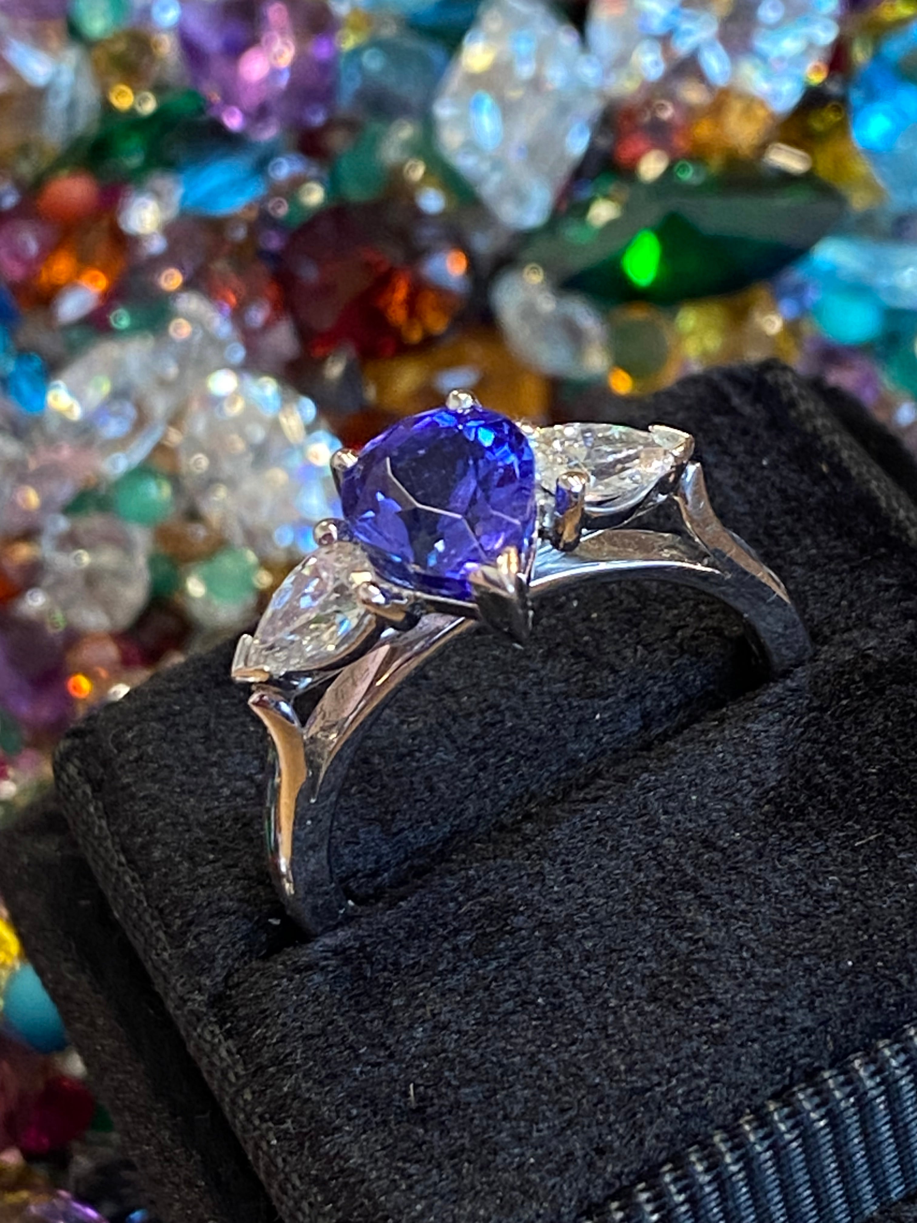 2.47 CTW Pear Cut Tanzanite and Natural Diamond Three Stone Ring in Platinum