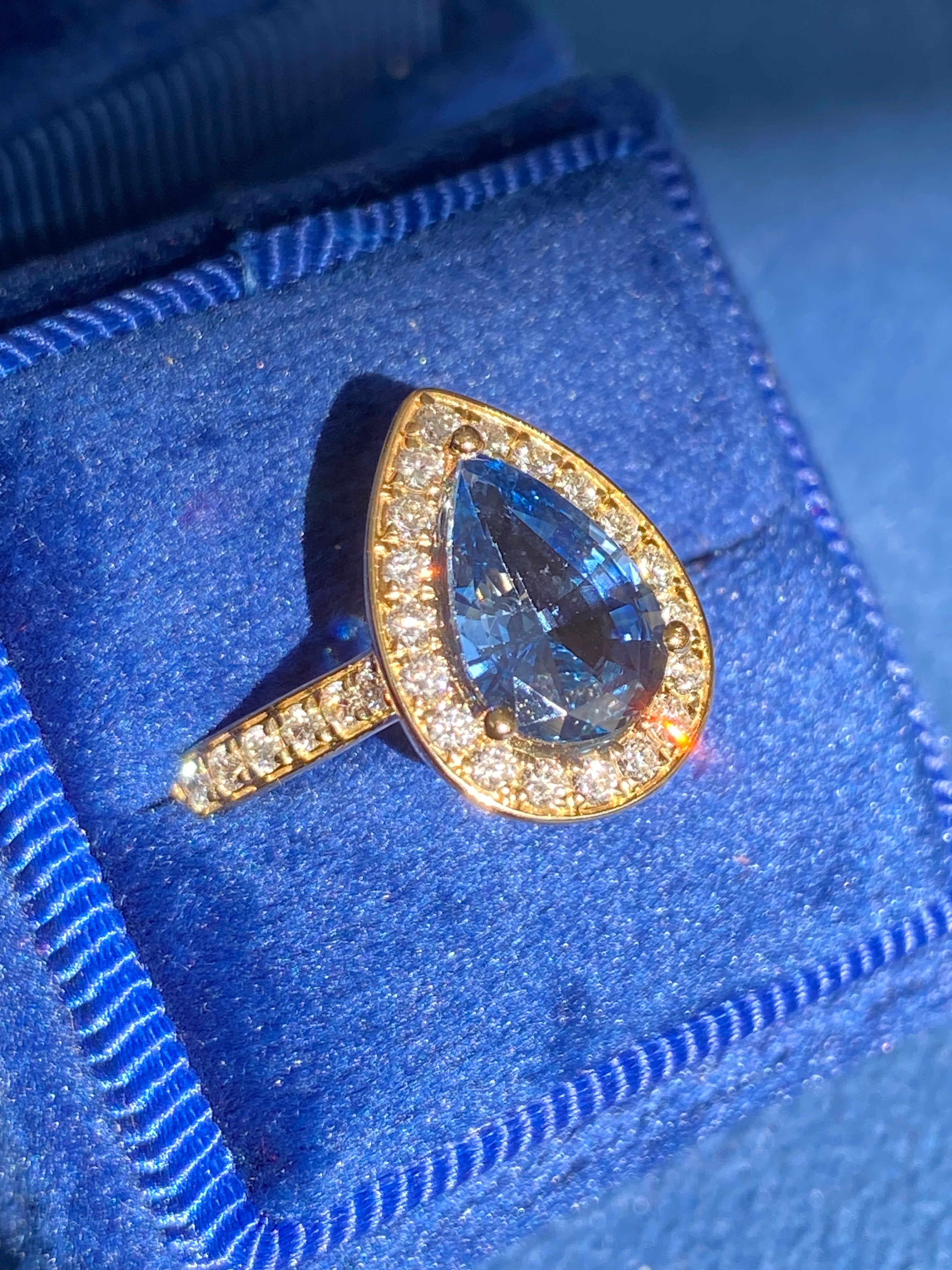 2.07 Carat Pear Cut Teal Sapphire and 0.48 CTW Natural Diamond Ring in 18ct Yellow Gold