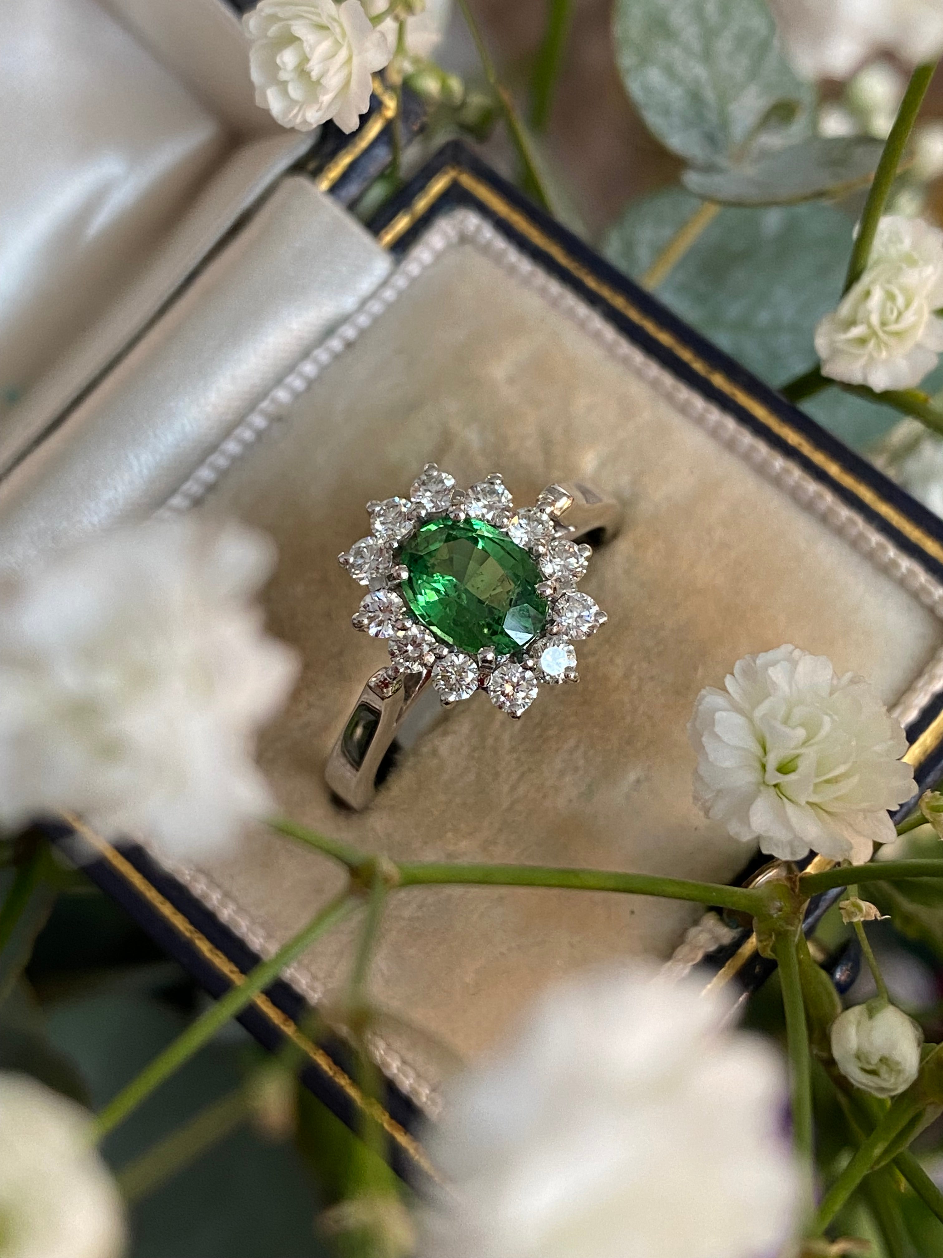1.50 CTW Tsavorite Garnet and Diamond Halo Engagement Ring in 18ct White Gold
