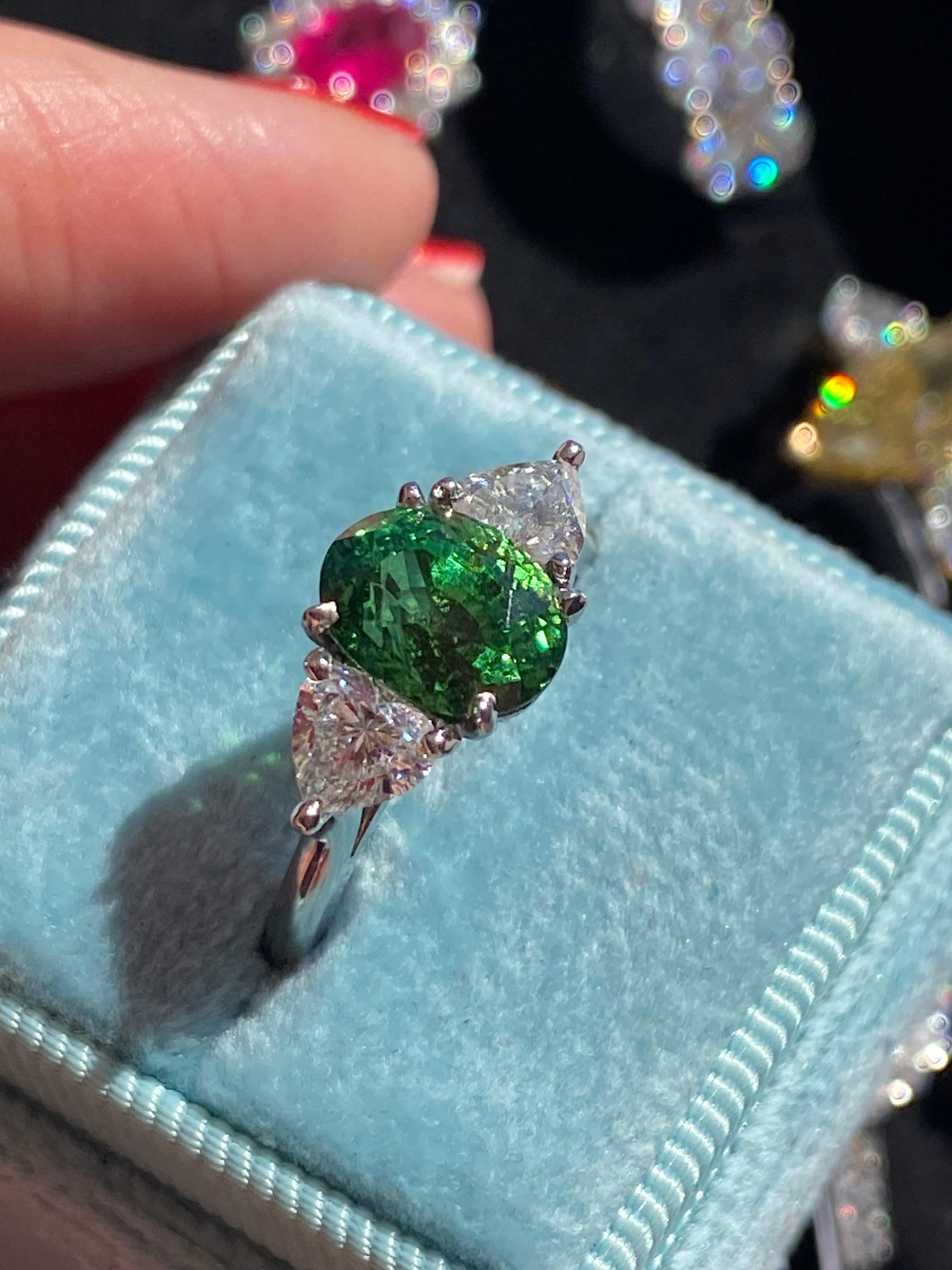 2.49 Carat Tsavorite Garnet and 0.83 Carat Diamond Three Stone Engagement Ring in Platinum