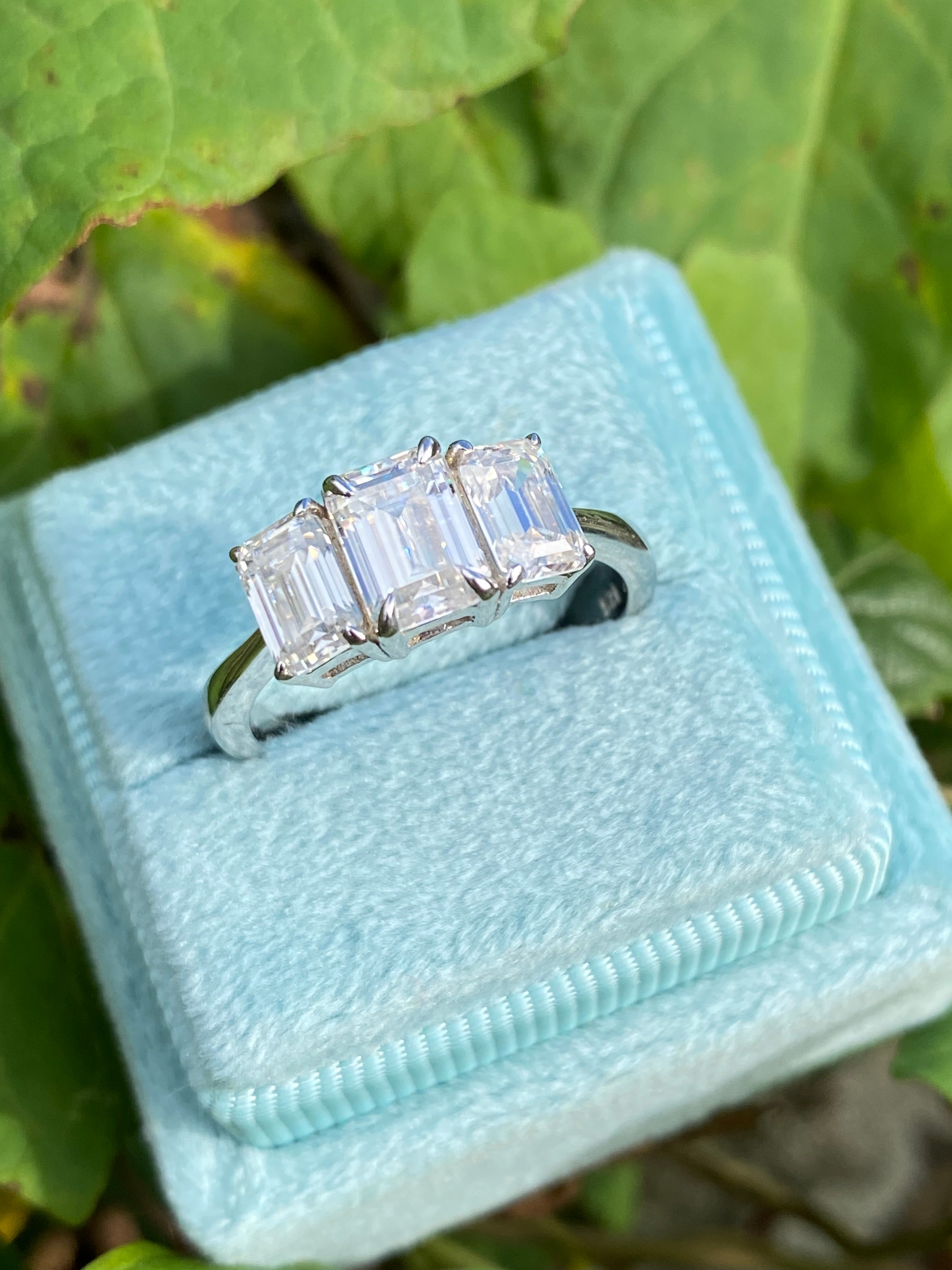 2.00 CTW Emerald Cut Moissanite Three Stone Engagement Ring in Sterling Silver