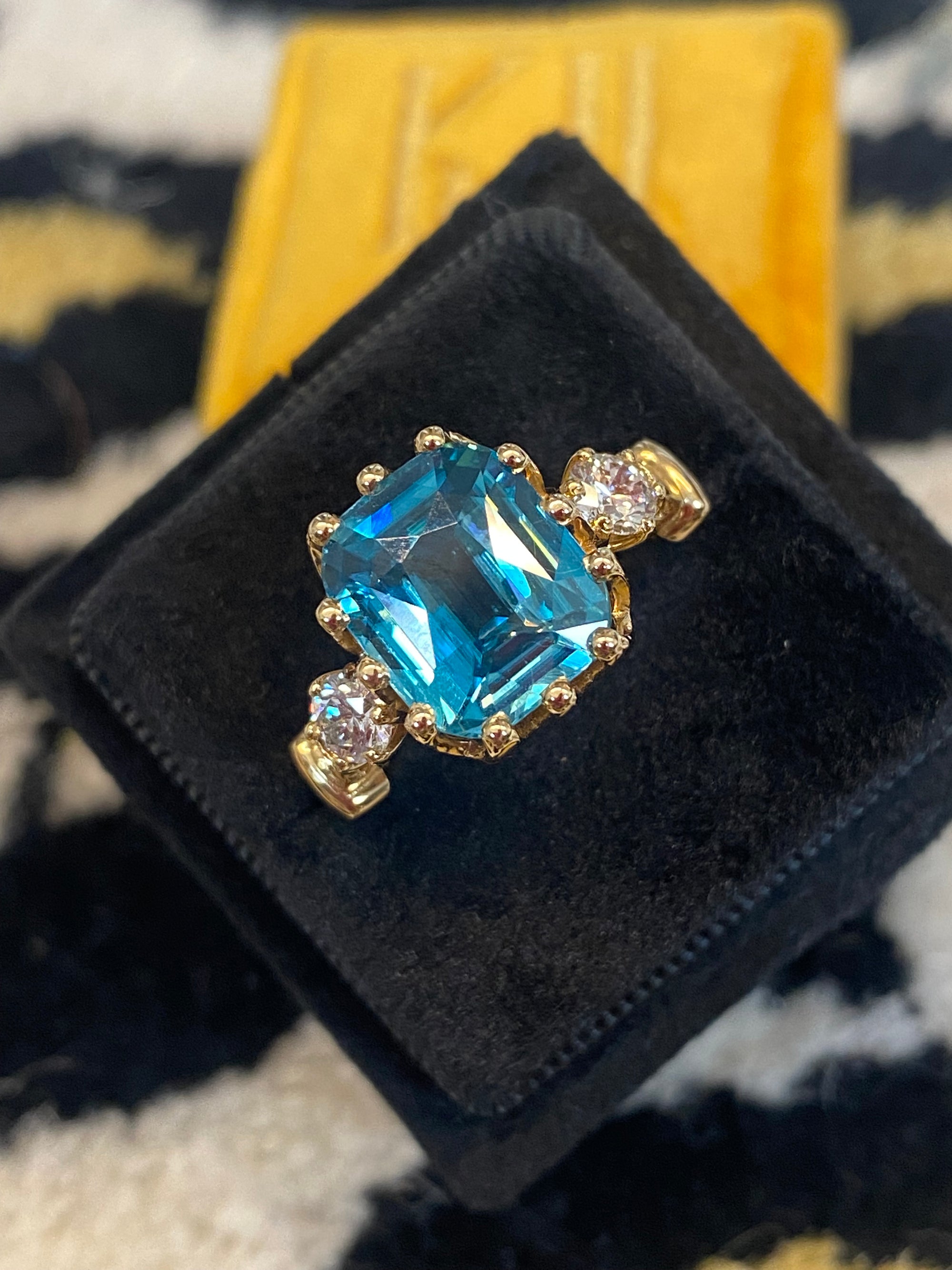 6.75 Carat Blue Zircon and Diamond Three Stone Ring in 18ct Yellow Gold