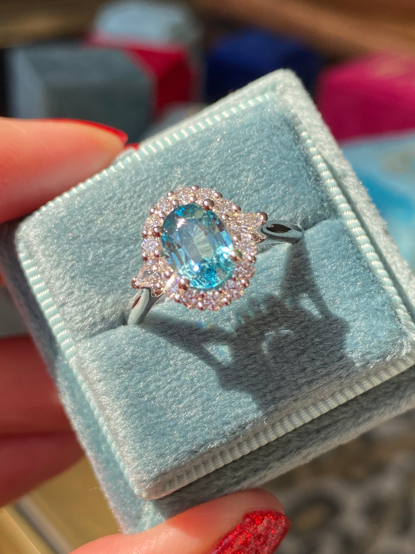 1.78 Carat Blue Zircon and Natural Diamond Halo Ring in Platinum