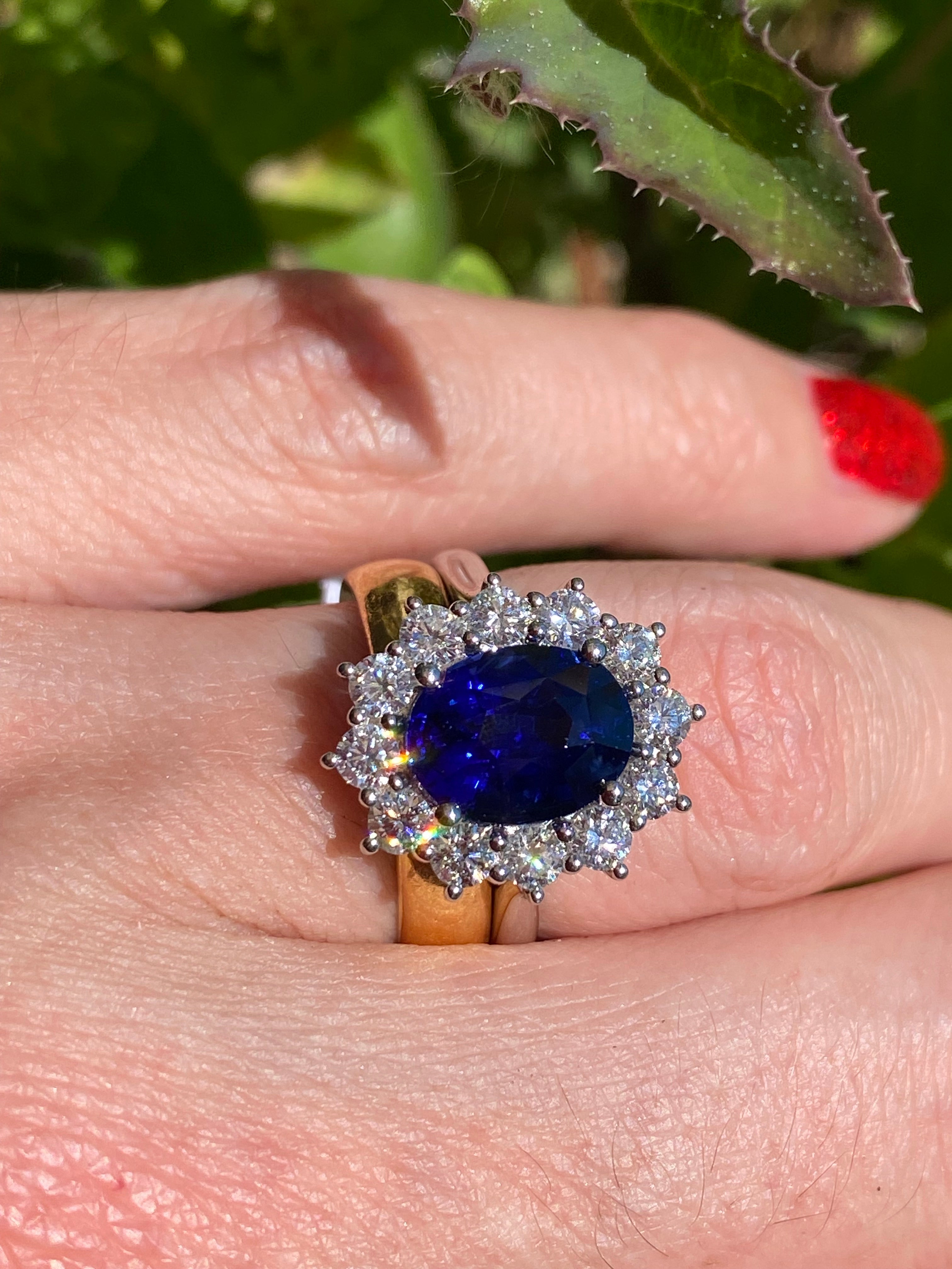 6.37 Carat Gubelin Certed Blue Ceylon Sapphire and 1.80 CTW Natural Diamond Halo Ring in Platinum