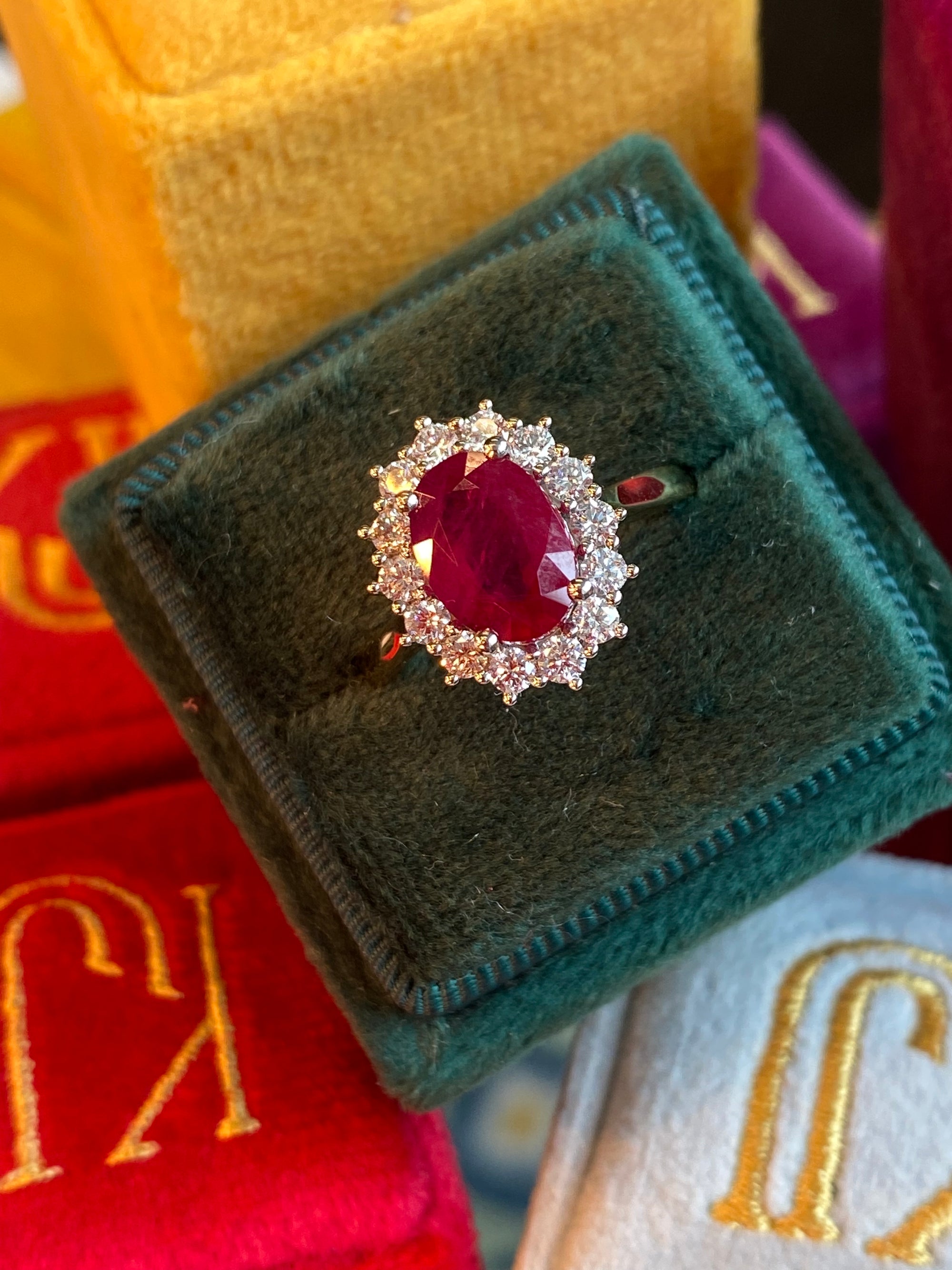 2.95ctw Oval-Cut Ruby and Natural Diamond Halo Ring in Platinum and 18ct Yellow Gold