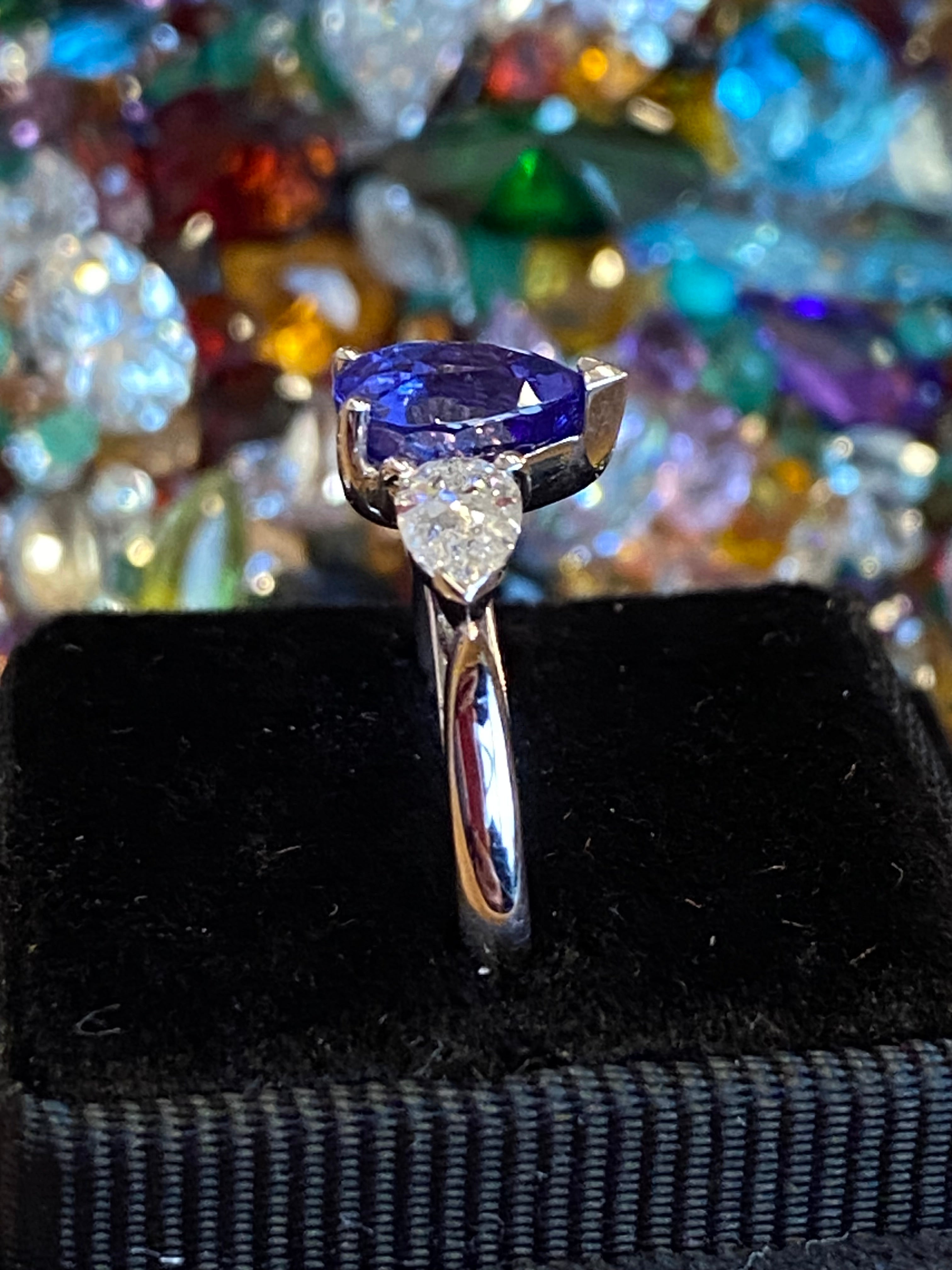 2.47 CTW Pear Cut Tanzanite and Natural Diamond Three Stone Ring in Platinum