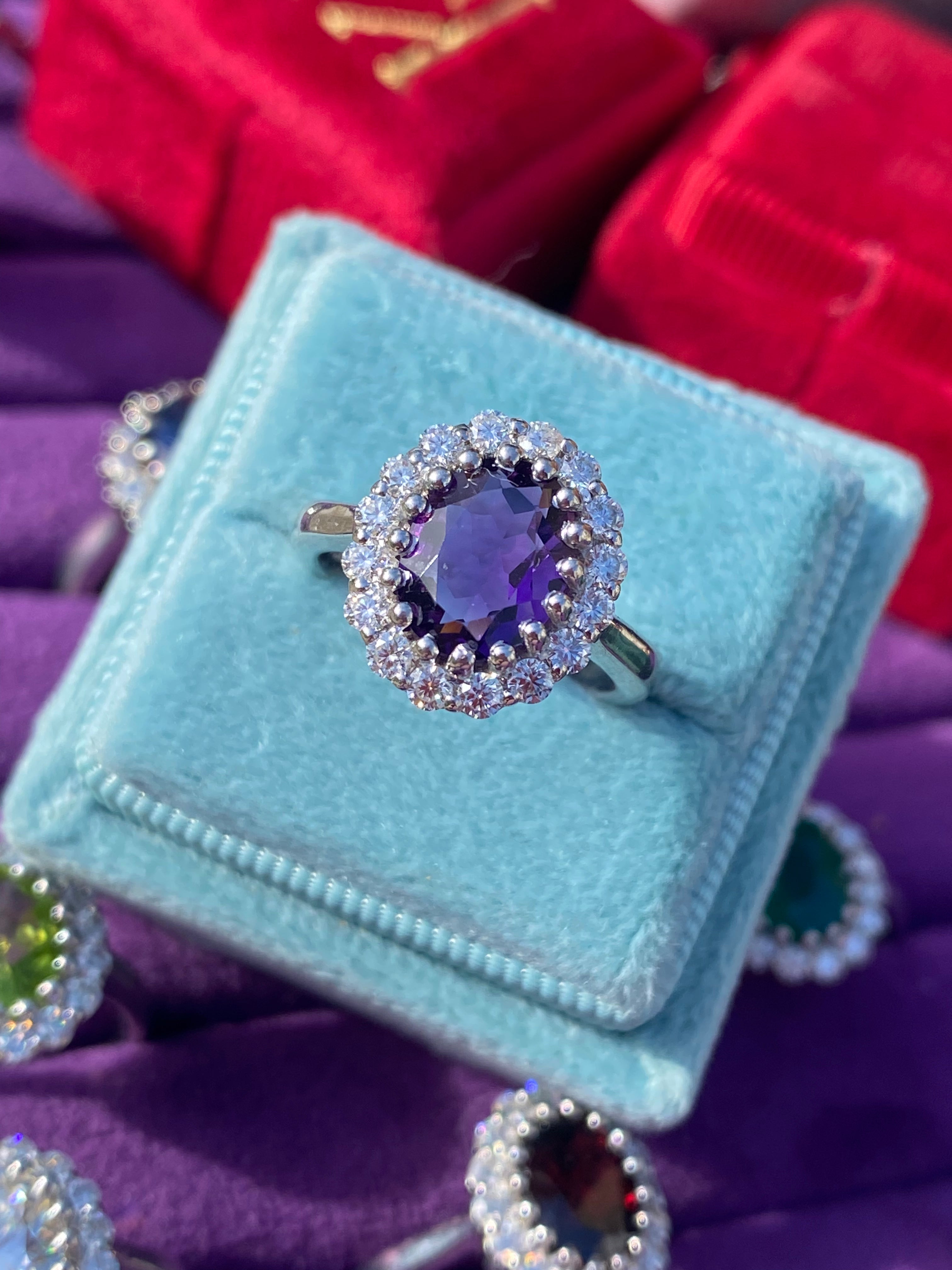 2.33 CTW Oval Cut Amethyst and Moissanite Halo Cocktail Ring in Sterling Silver