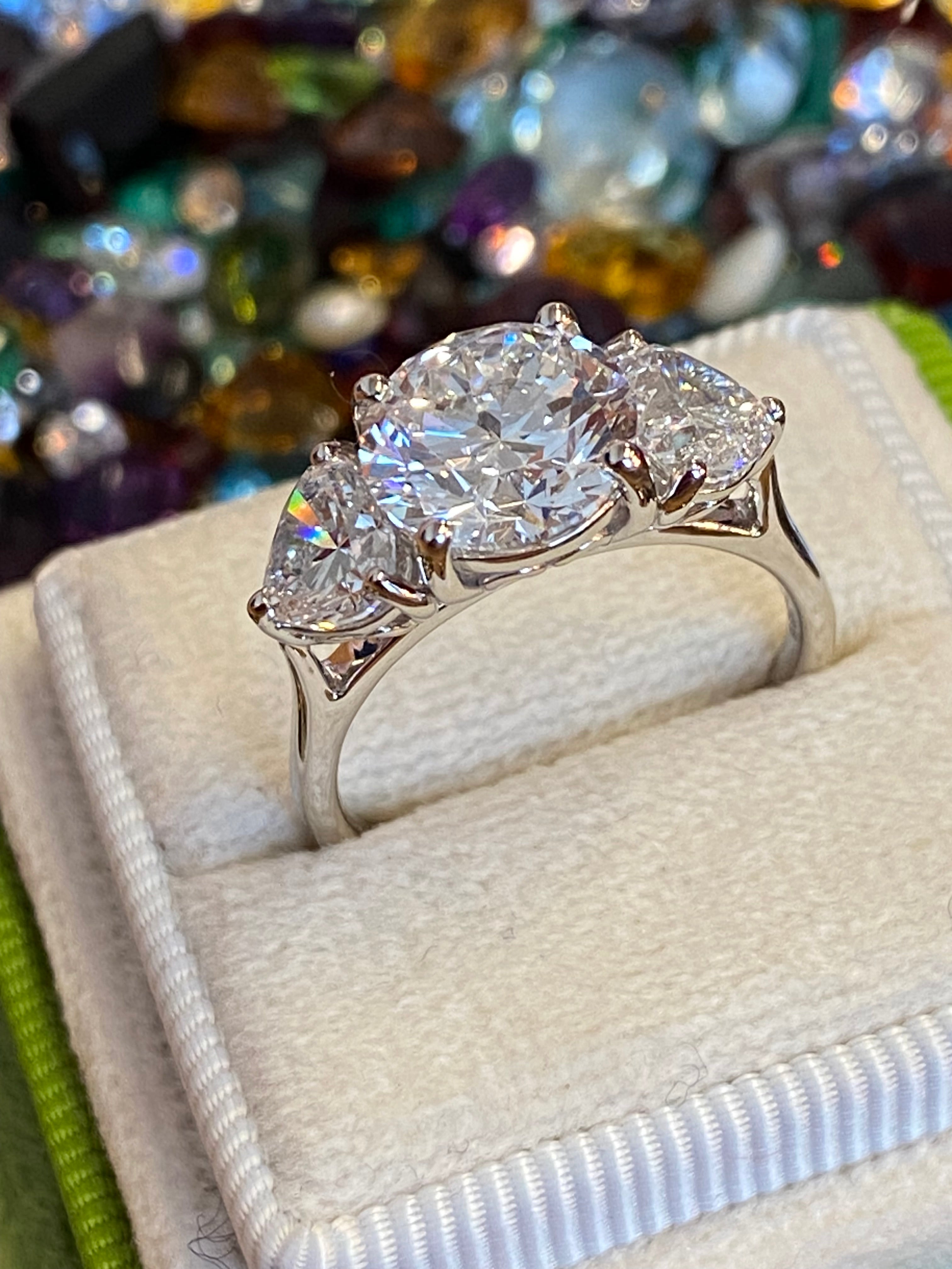 3.80CT + Brilliant Cut Oval and Heart Lab Grown Diamond Three Stone Engagement Ring, D Colour / VS Clarity in Platinum