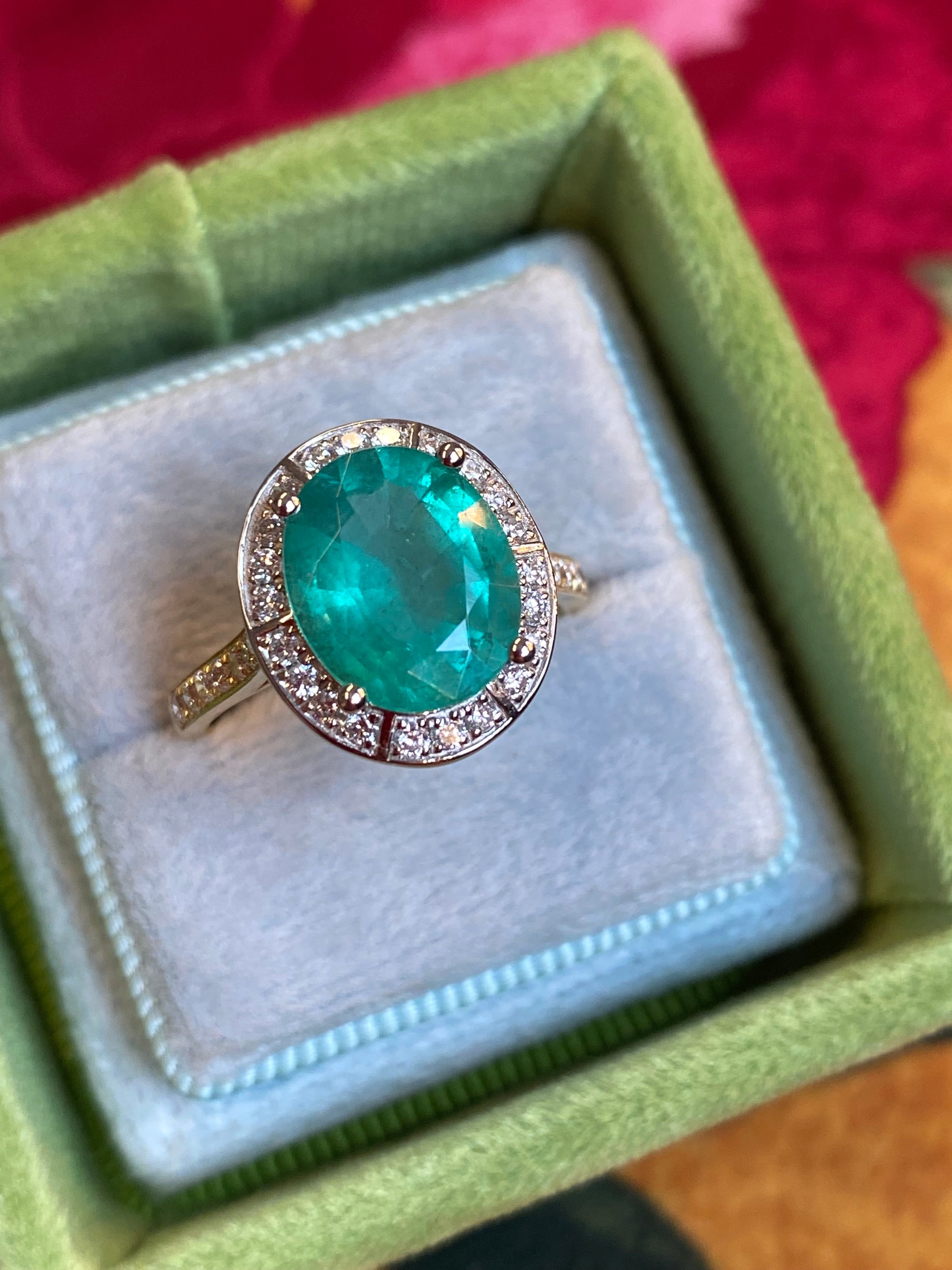 3.21 CTW Oval Cut Emerald and Natural Diamond Halo Engagement Ring in Platinum and 18ct Yellow Gold