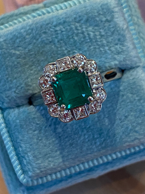 1.35 Carat Emerald Cut Emerald and 0.49 CTW Natural Diamond Halo Ring in Platinum