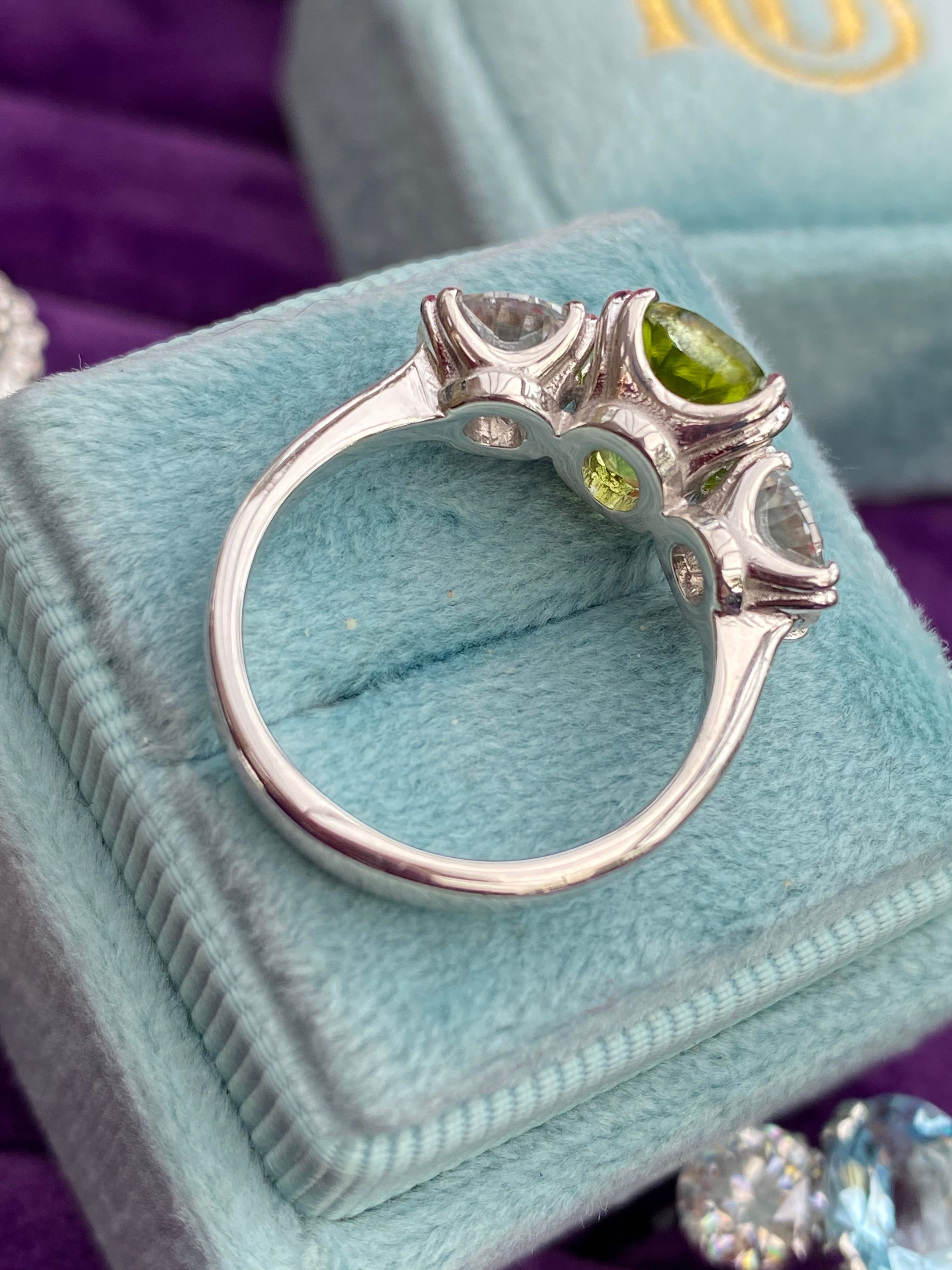 2.57 Carat Peridot and 1.84 Carat Moissanite Three Stone Ring in Sterling Silver