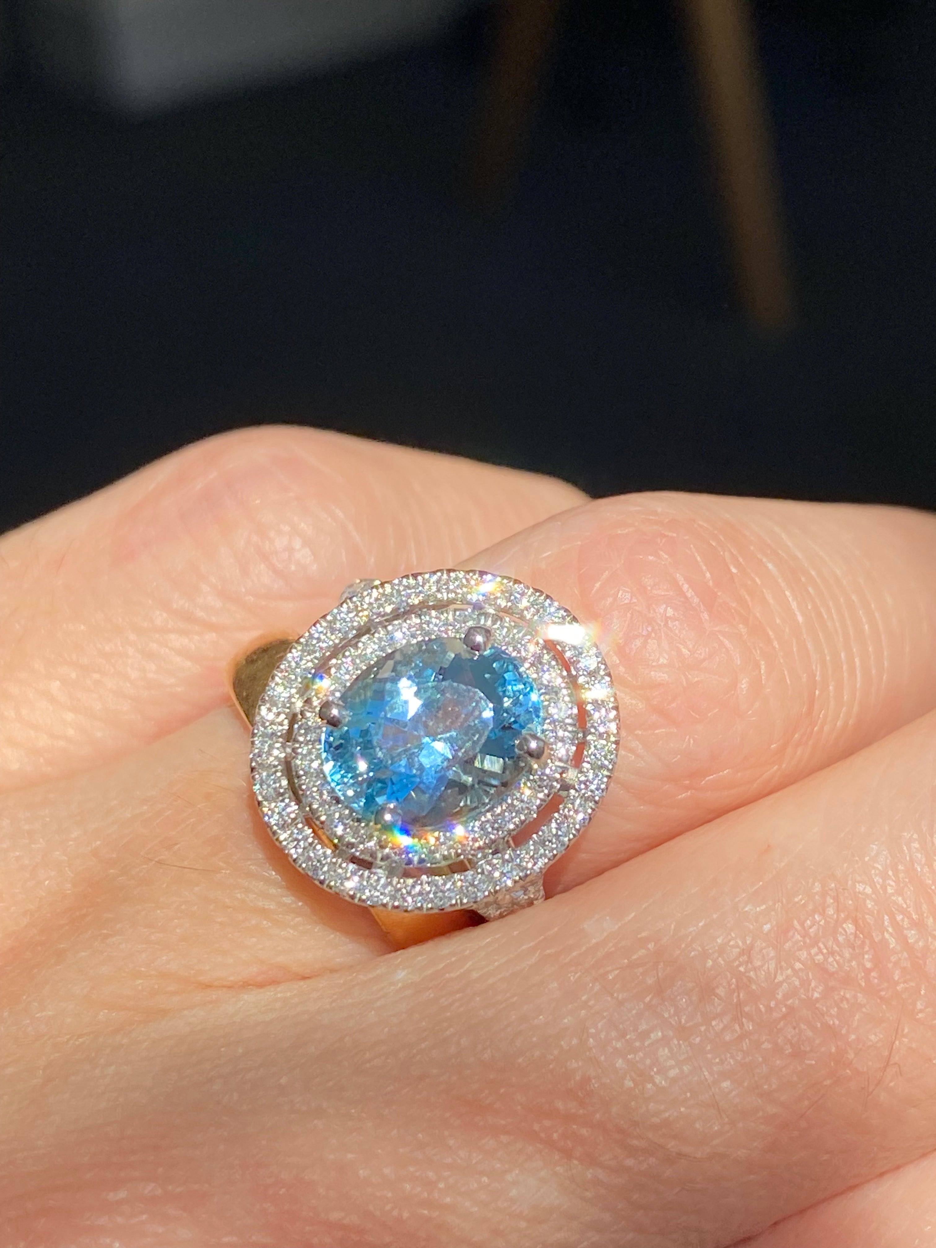 3.23 CTW Oval Cut Aquamarine and Natural Diamond Double Halo Engagement Ring in Platinum
