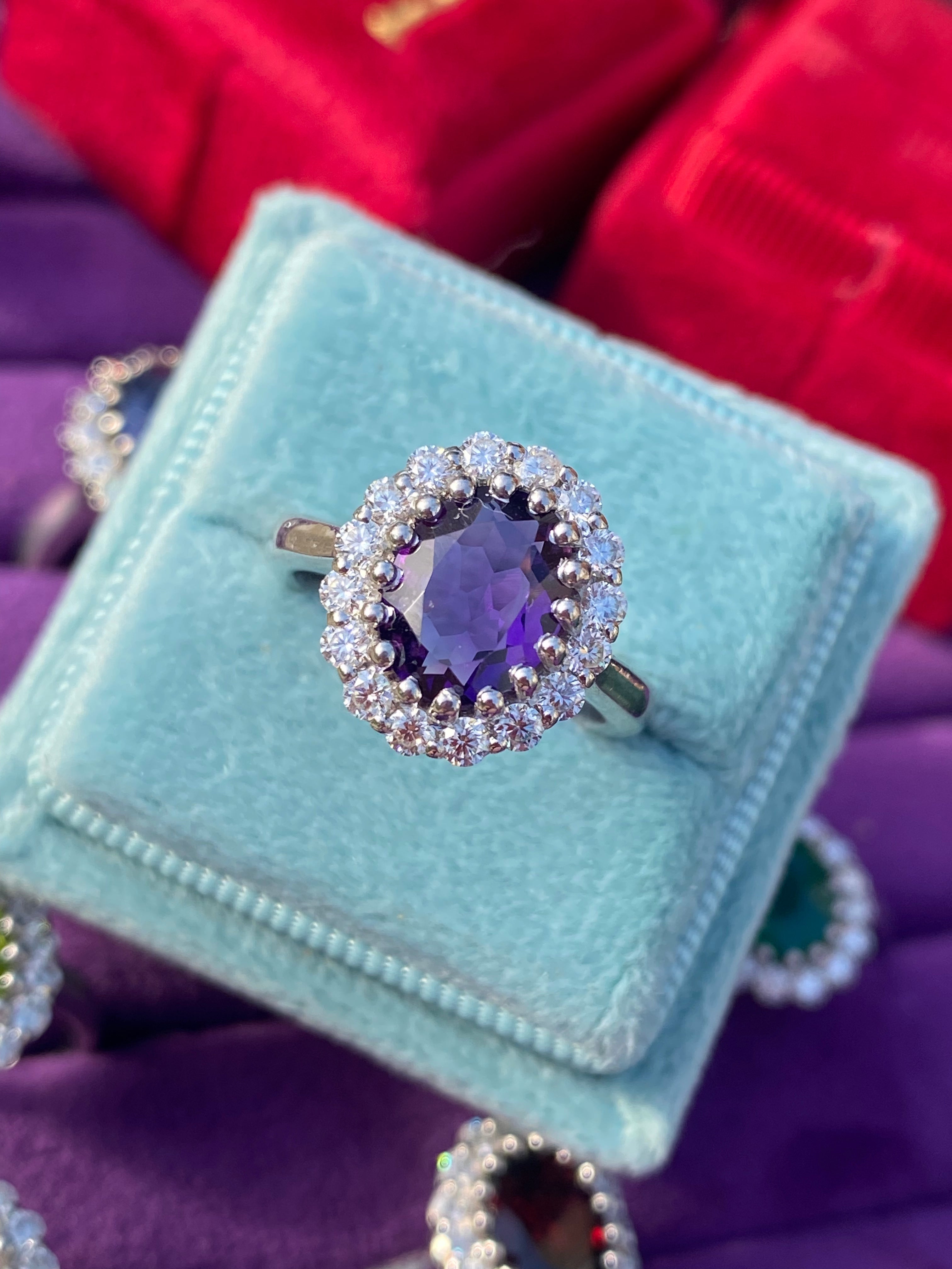 2.33 CTW Oval Cut Amethyst and Moissanite Halo Cocktail Ring in Sterling Silver