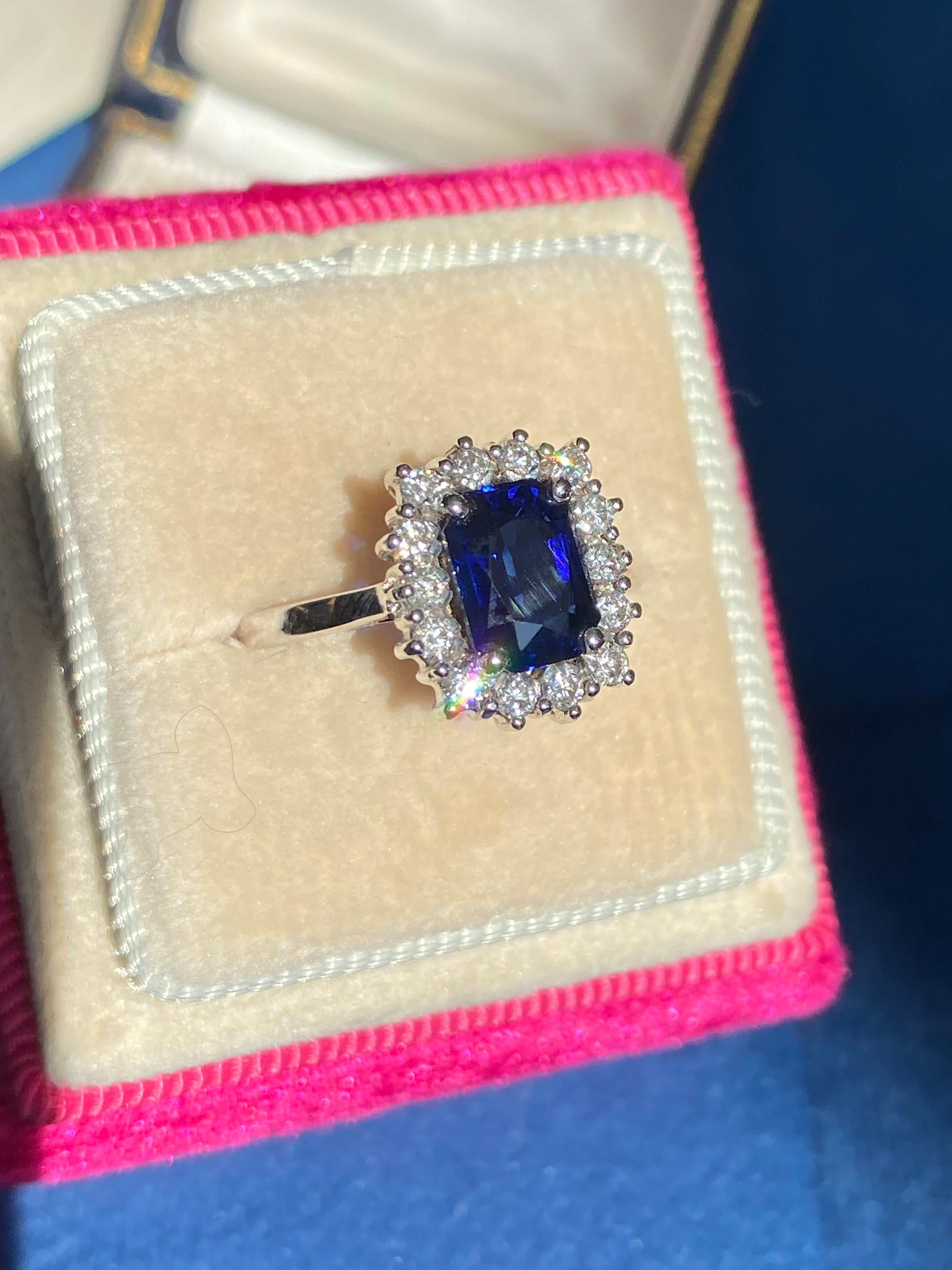 Vintage 2.05 Carat Sapphire and Natural Diamond Halo Ring in Platinum