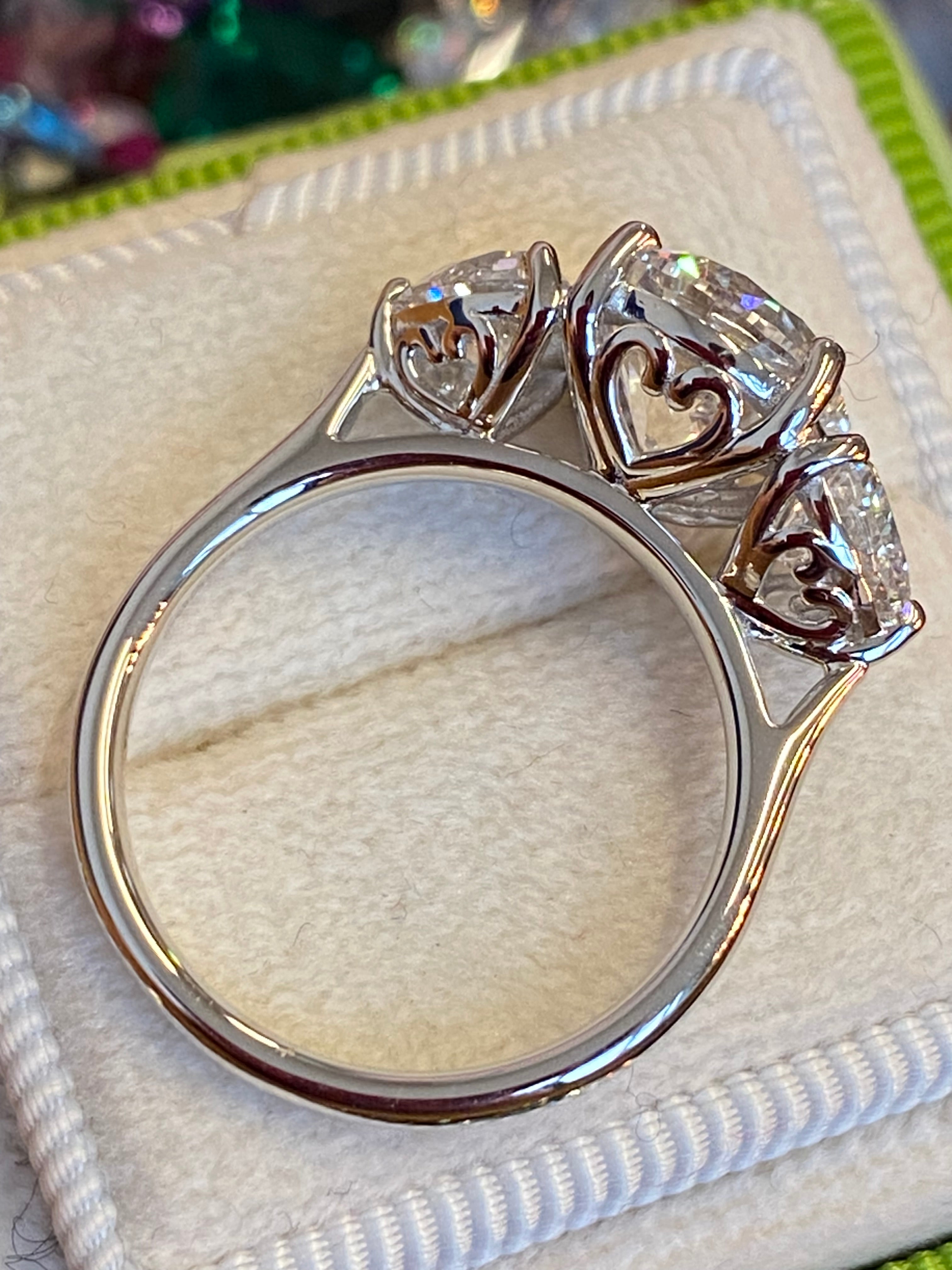 3.80CT + Brilliant Cut Oval and Heart Lab Grown Diamond Three Stone Engagement Ring, D Colour / VS Clarity in Platinum