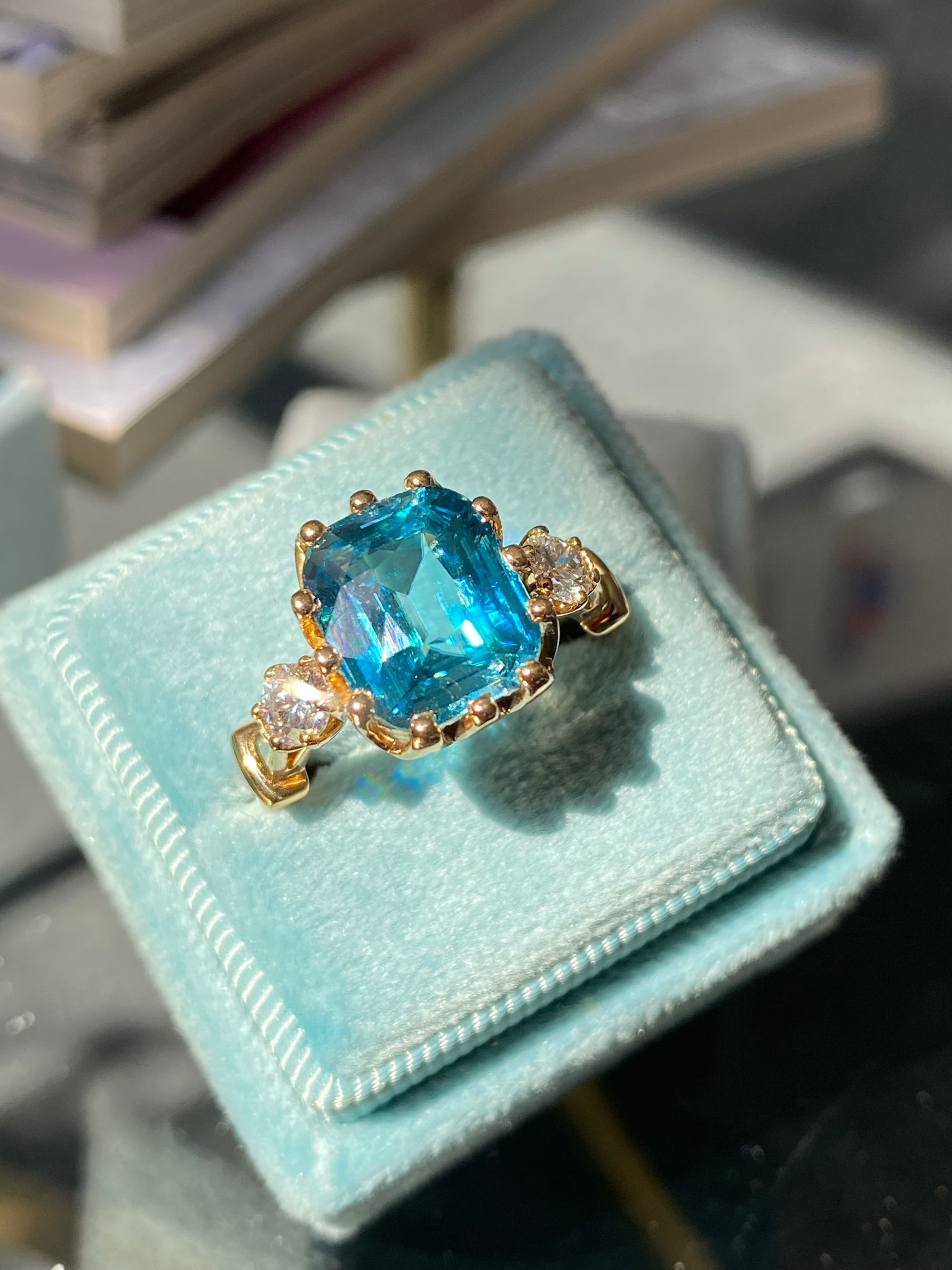 6.75 Carat Blue Zircon and Diamond Three Stone Ring in 18ct Yellow Gold