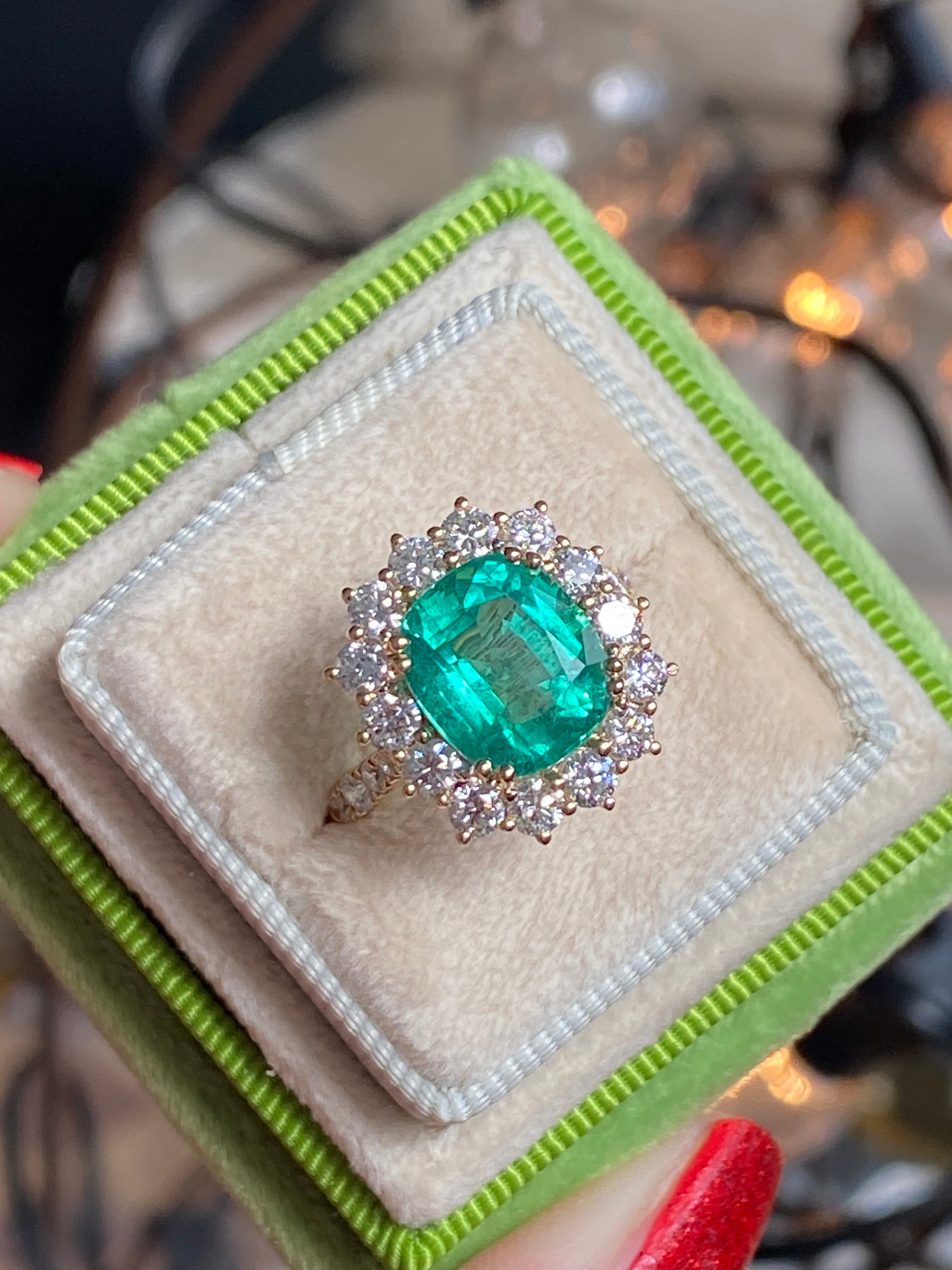 5.31 CTW Cushion Cut Emerald and Natural Diamond Halo Ring in 18ct Yellow Gold