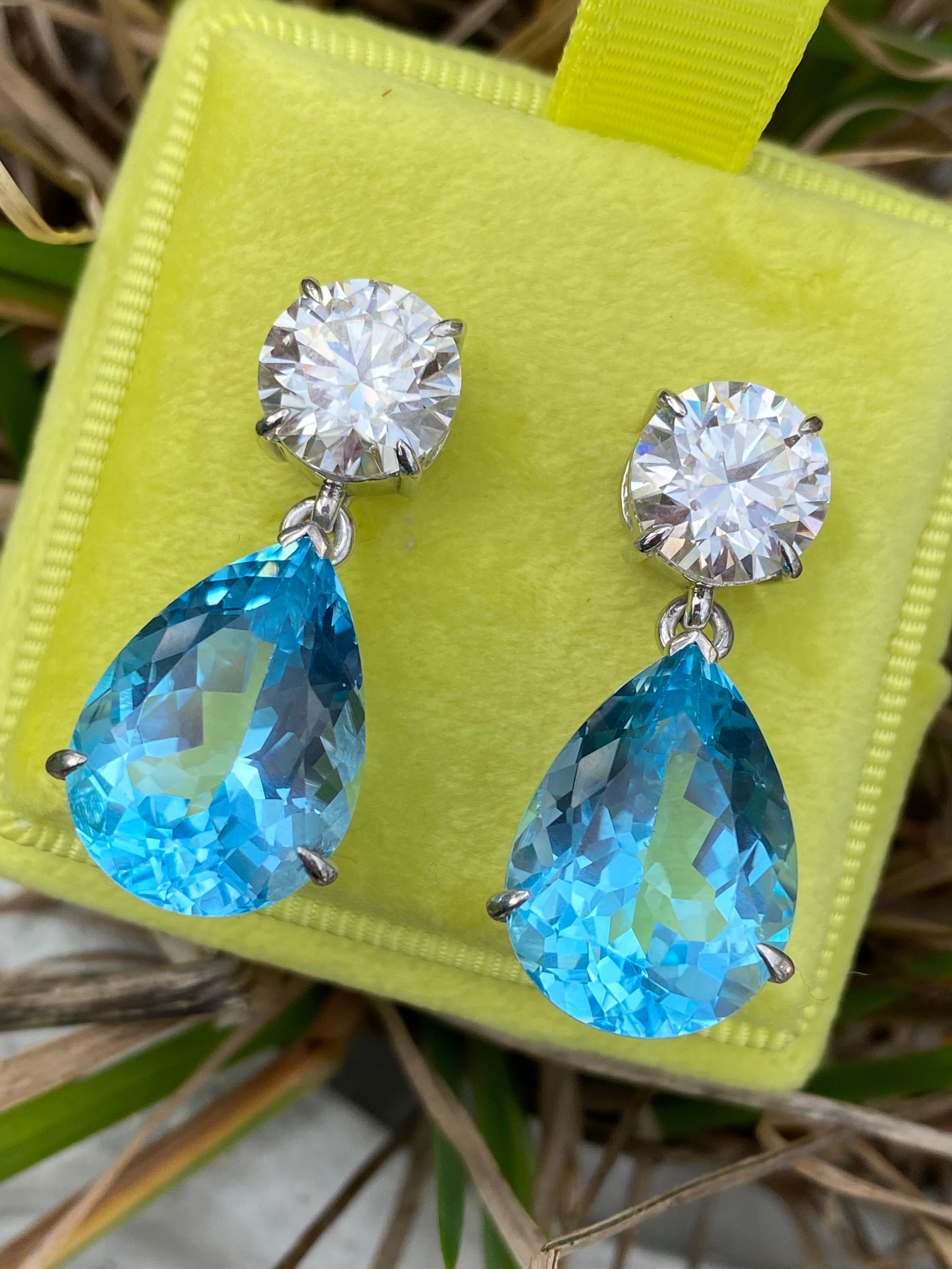28.00 Carat Pear Cut Blue Topaz and 6.00 CTW Moissanite Earrings in Sterling Silver
