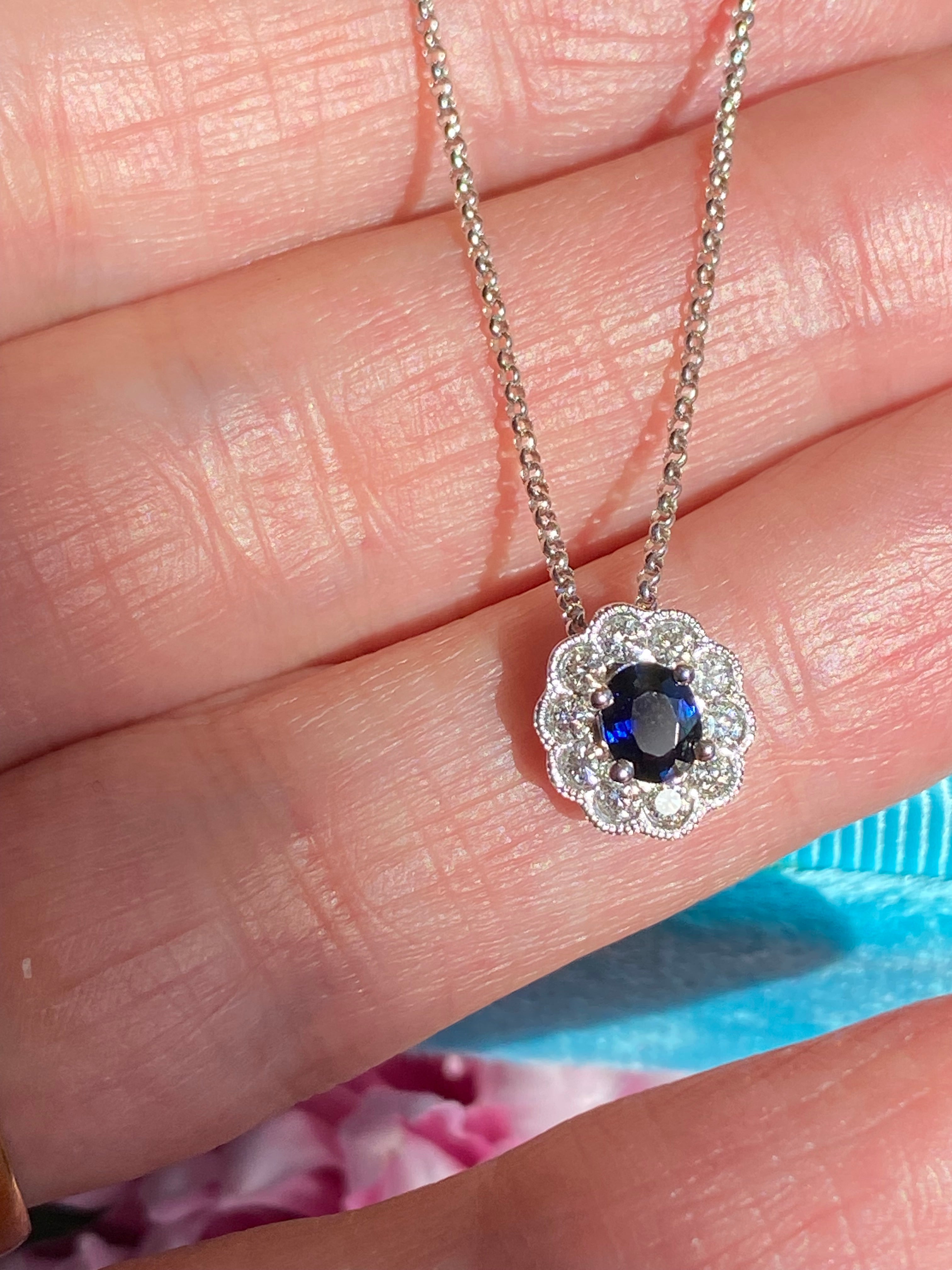 0.73 CTW Sapphire and Natural Diamond Pendant Necklace in 18ct White Gold