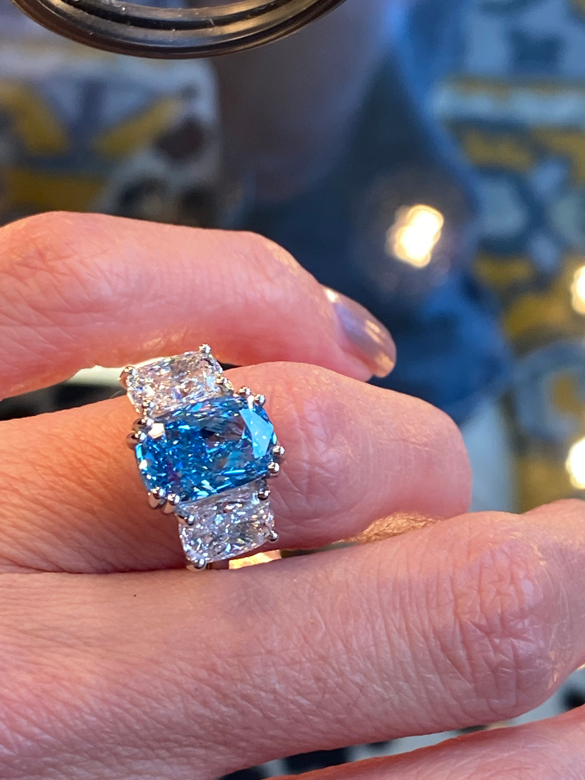 6.60 CTW Fancy Blue Cushion Cut Lab Diamond Graduated Three Stone Ring in Platinum