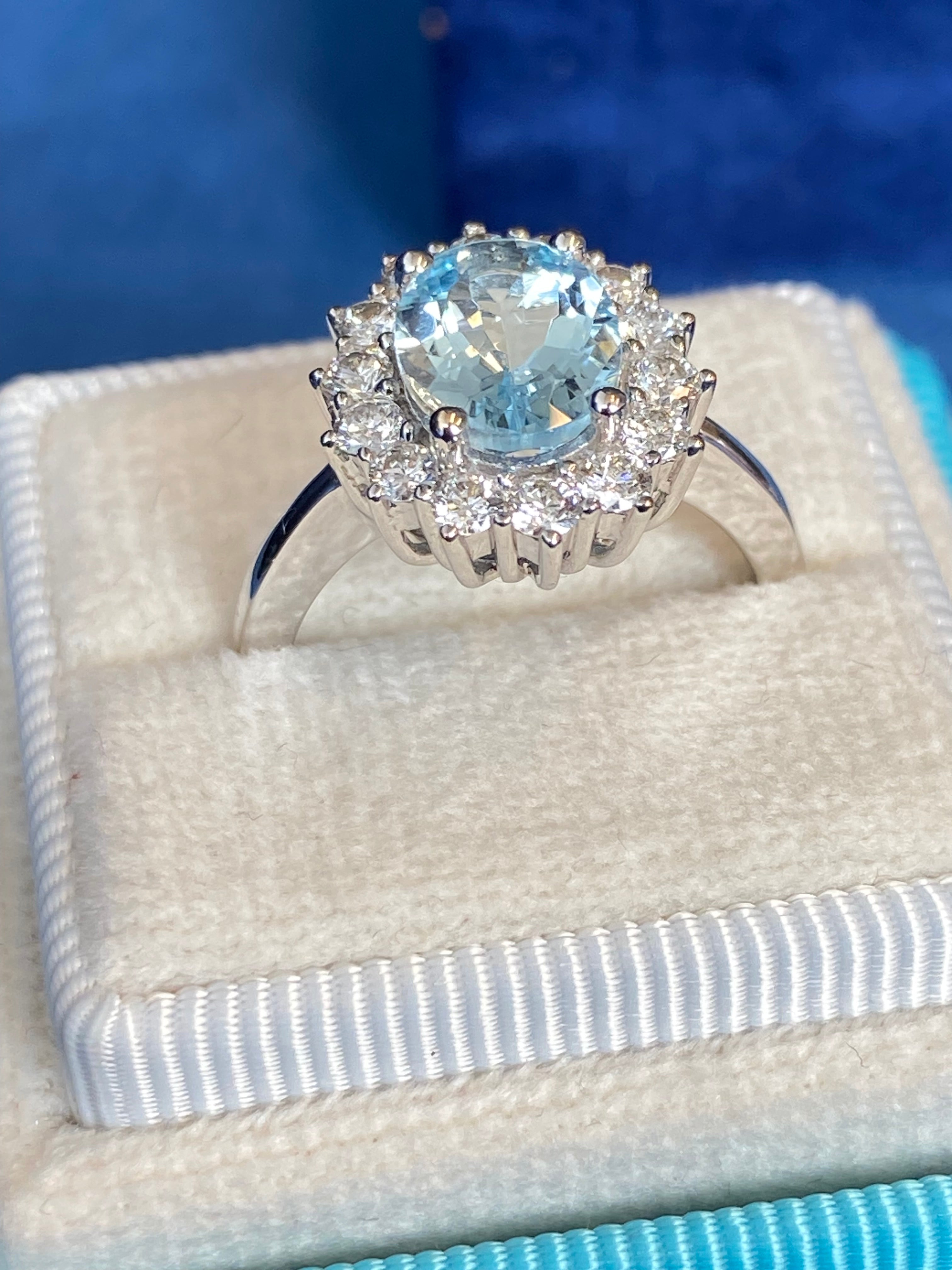 2.02 CTW Oval Cut Aquamarine and Natural Diamond Halo Engagement Ring in Platinum