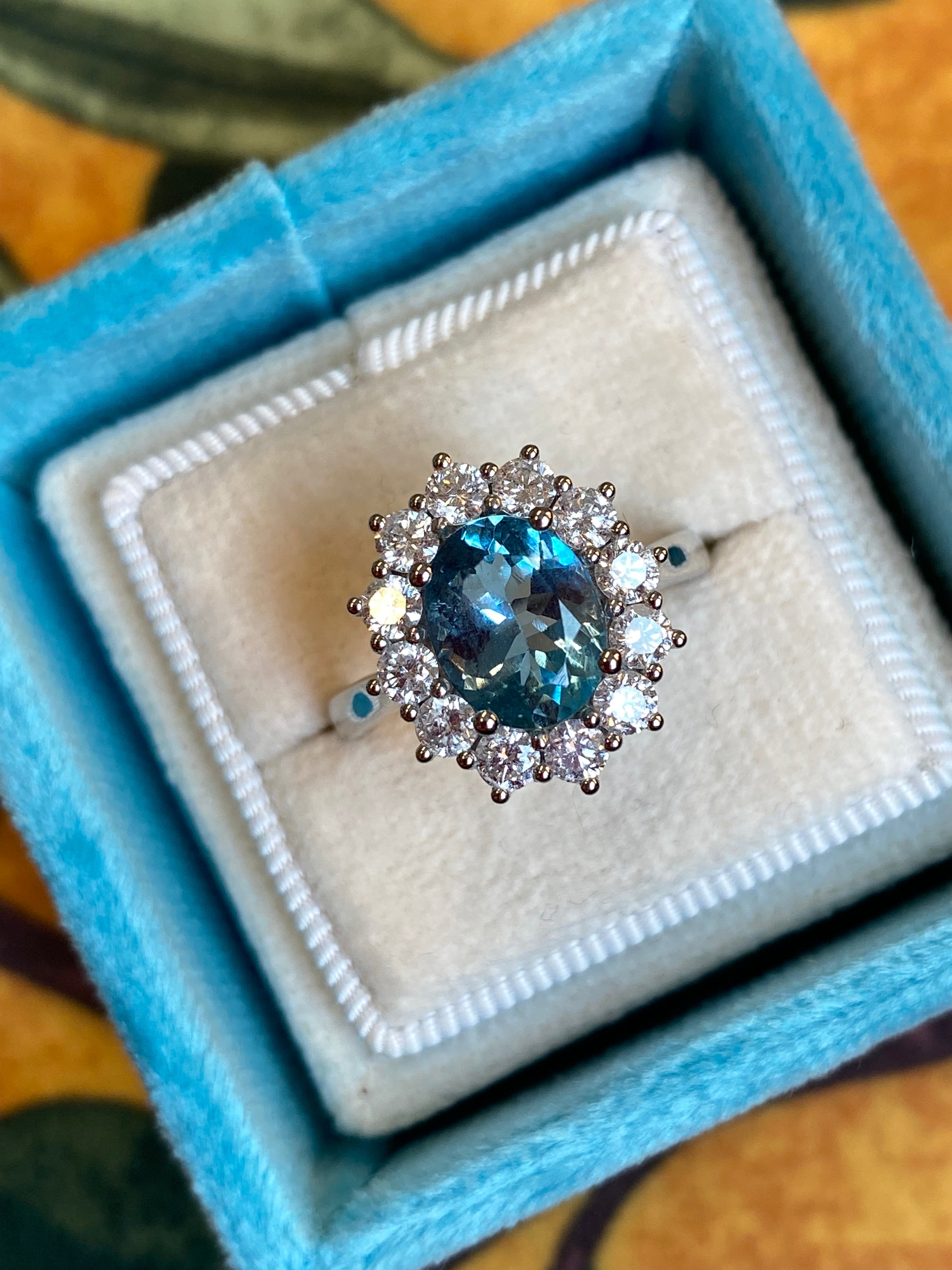 2.68 CTW Oval Cut Aquamarine and Natural Diamond Halo Engagement Ring in Platinum