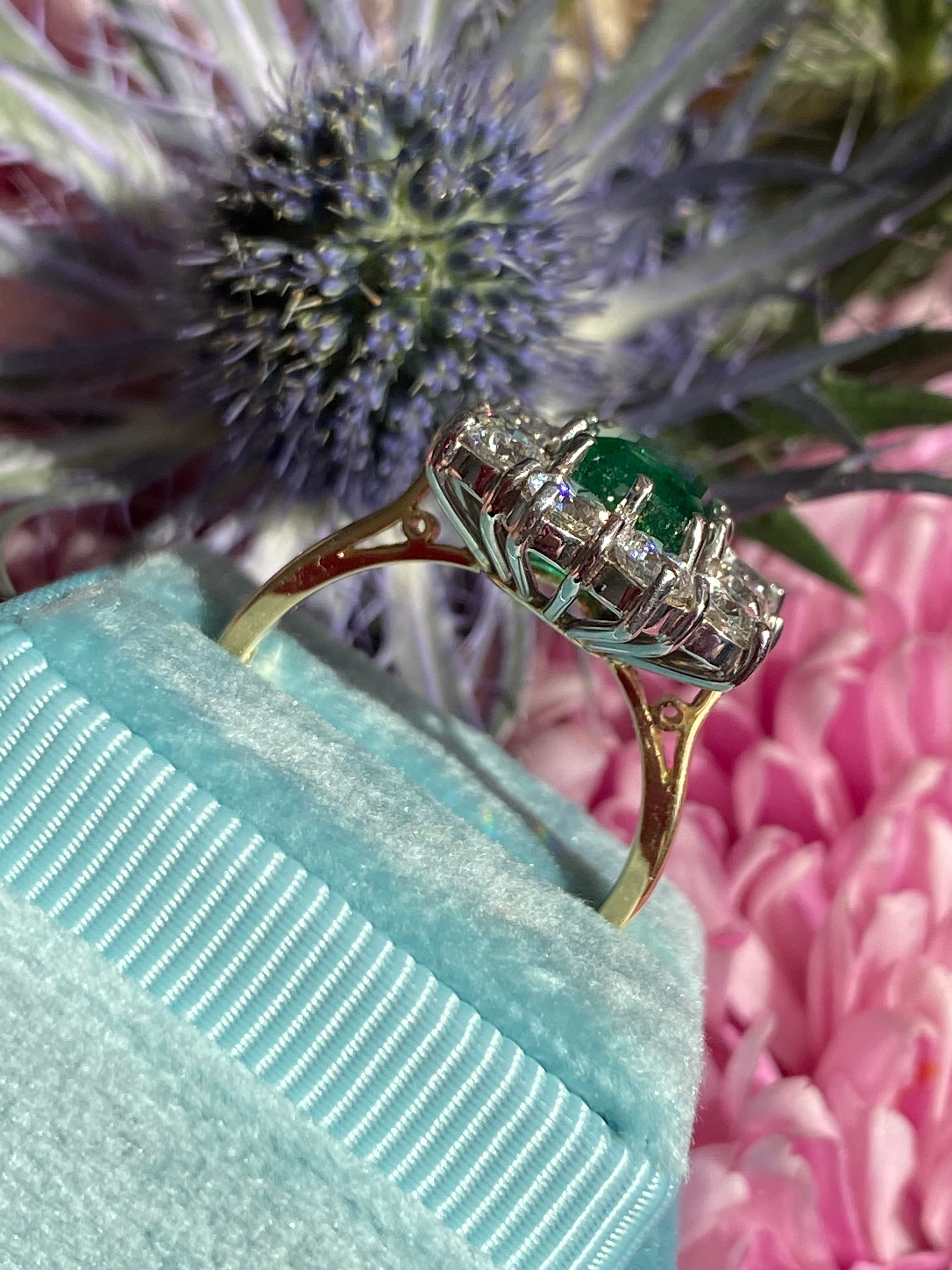 Outrageously Fantastic 4.17 CTW Emerald and Diamond Halo Ring in 18ct White and Yellow Gold