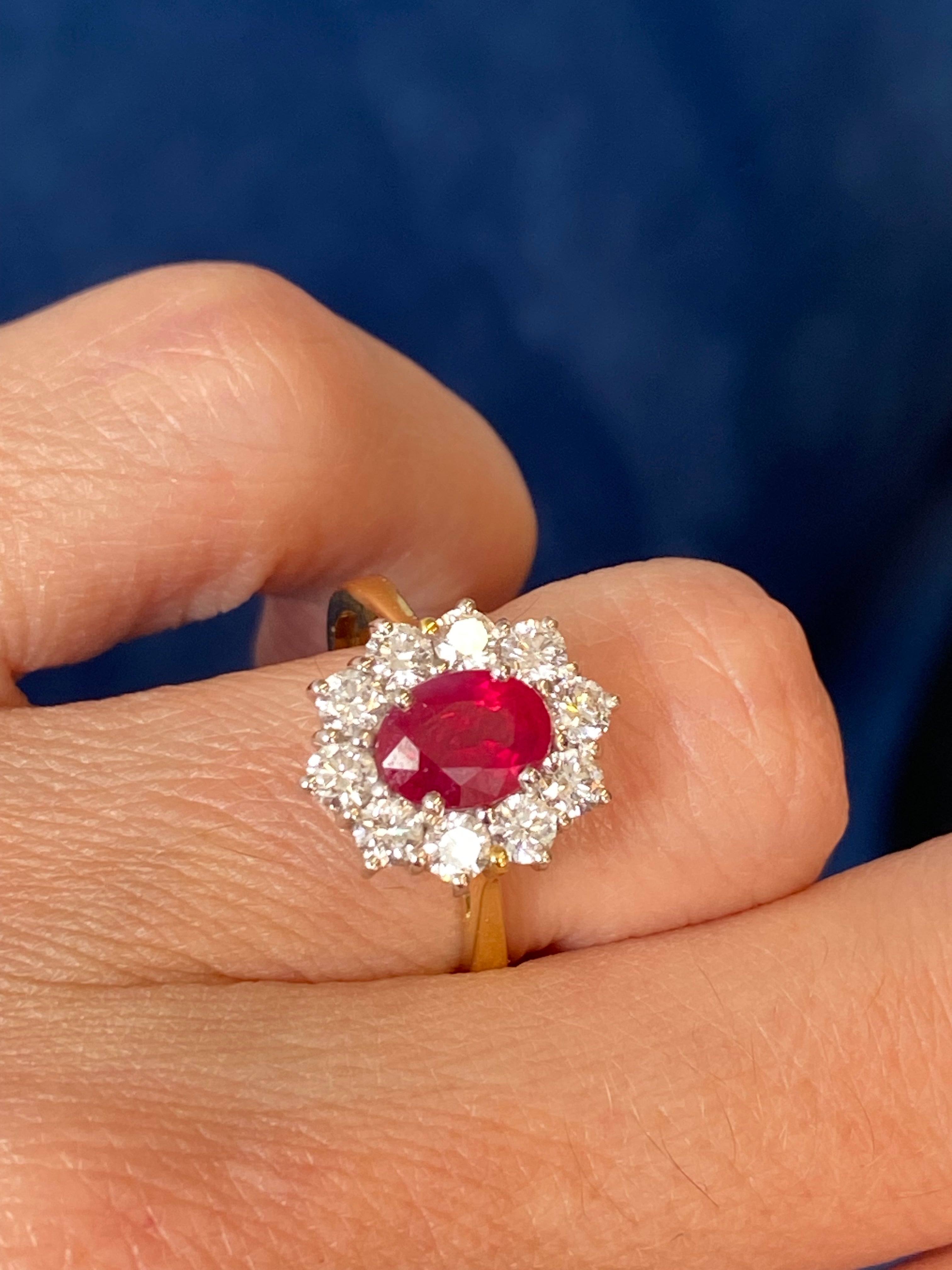 Breathtaking Ruby and Natural Diamond Halo Ring in 18ct Gold