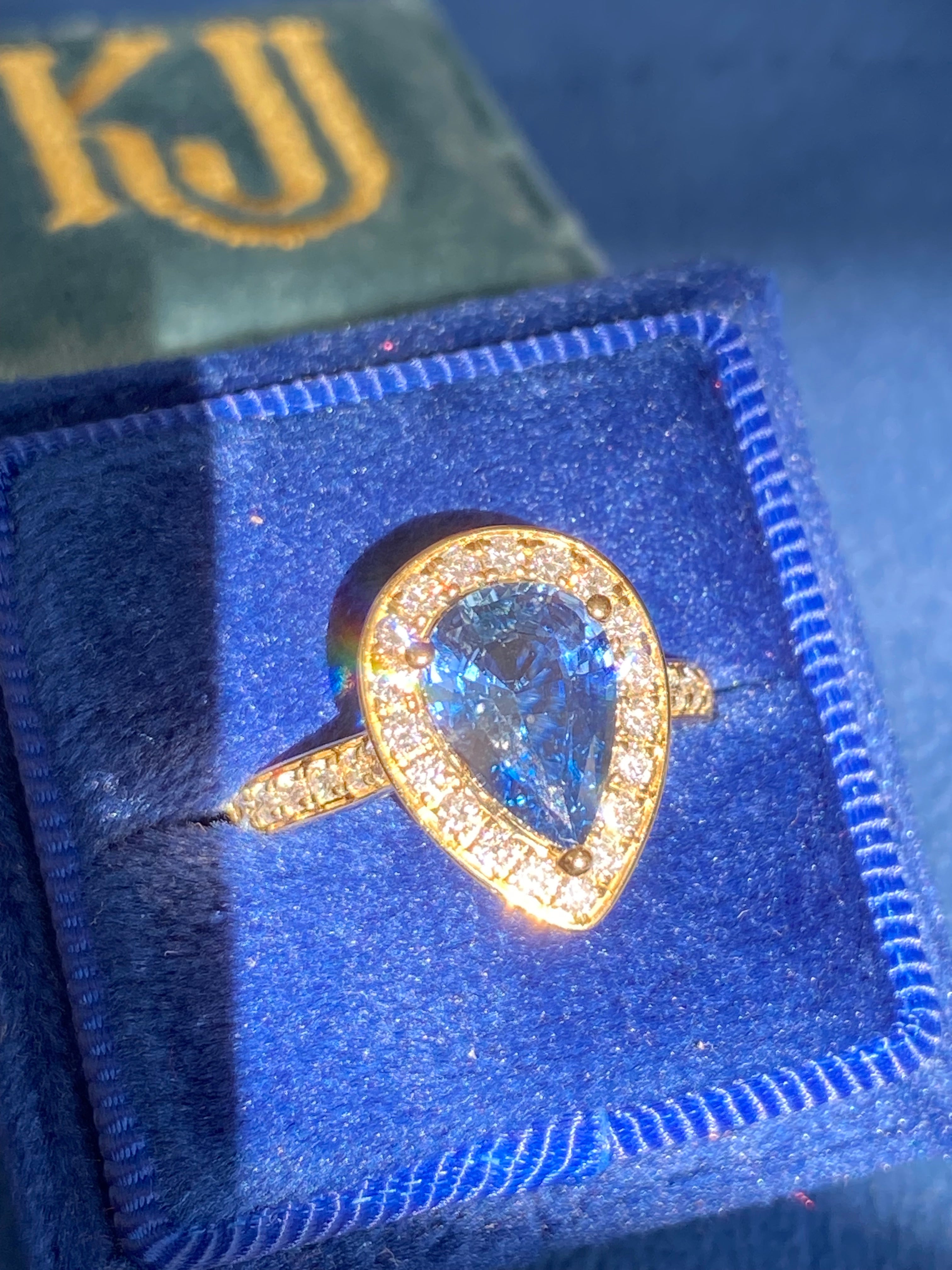 2.07 Carat Pear Cut Teal Sapphire and 0.48 CTW Natural Diamond Ring in 18ct Yellow Gold