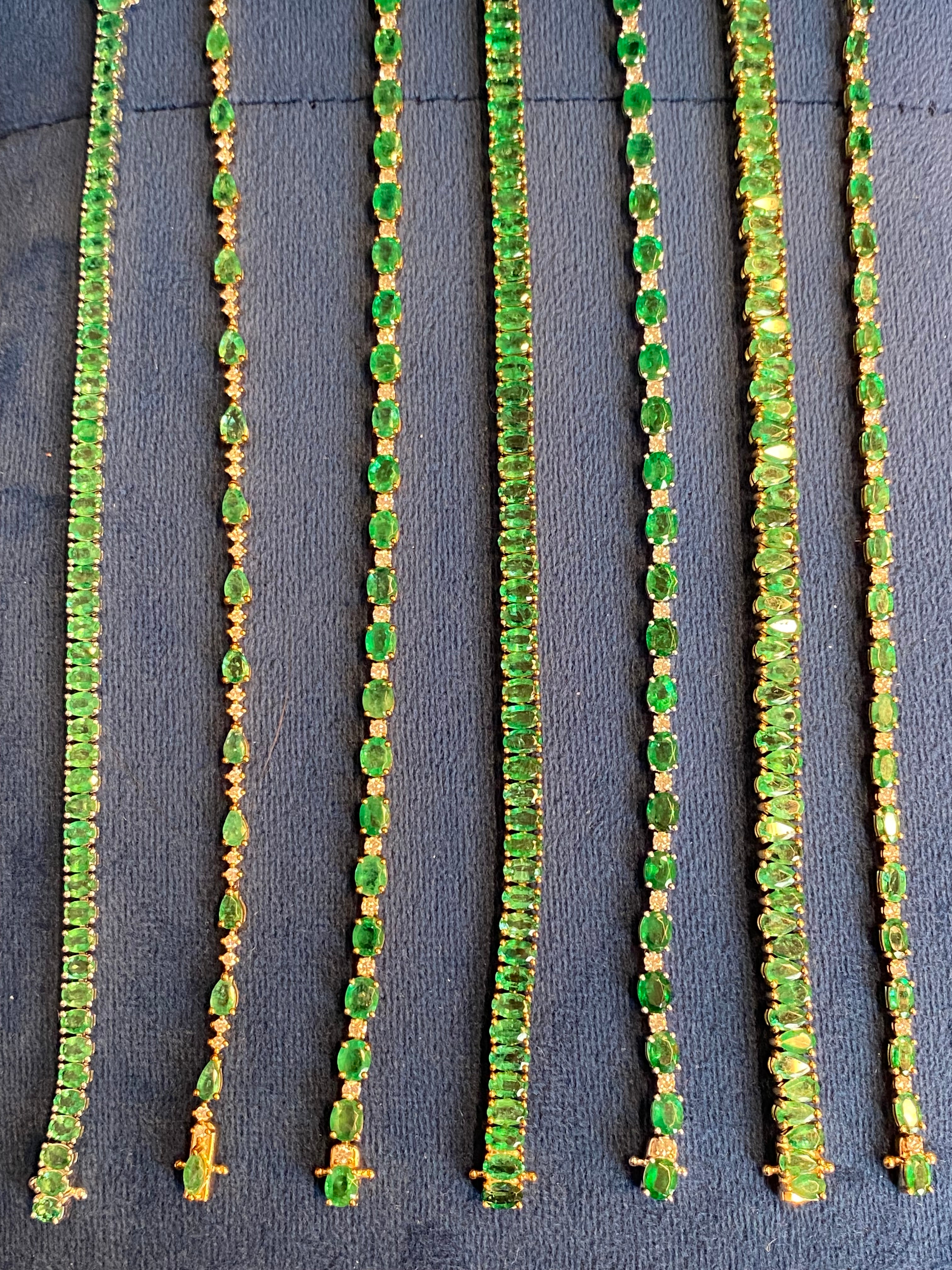 4.22 CTW Emerald and Natural Diamond Line Tennis Bracelet in 9ct Yellow Gold