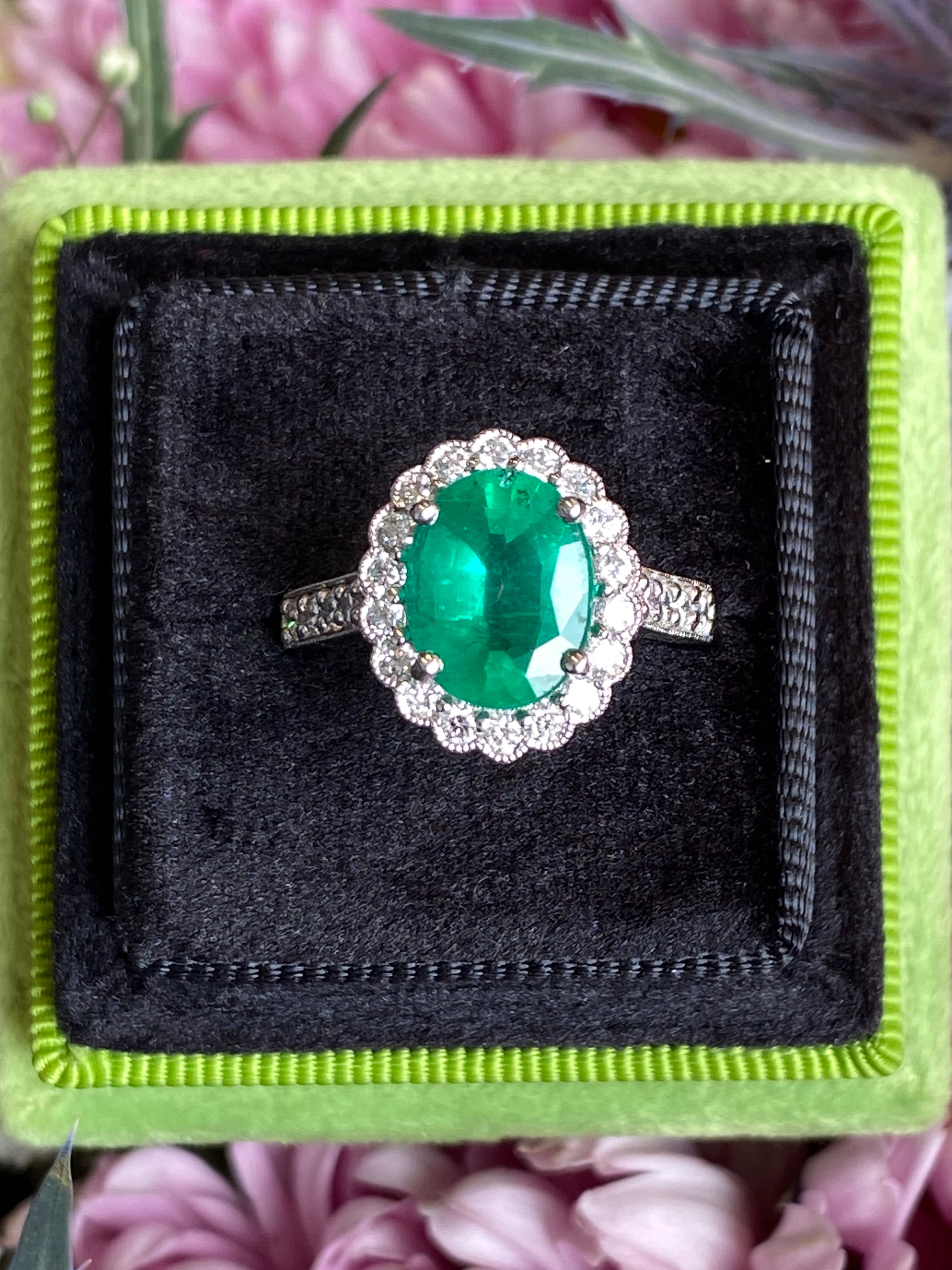 3.12 CTW Oval Cut Emerald and Natural Diamond Halo Ring in Platinum