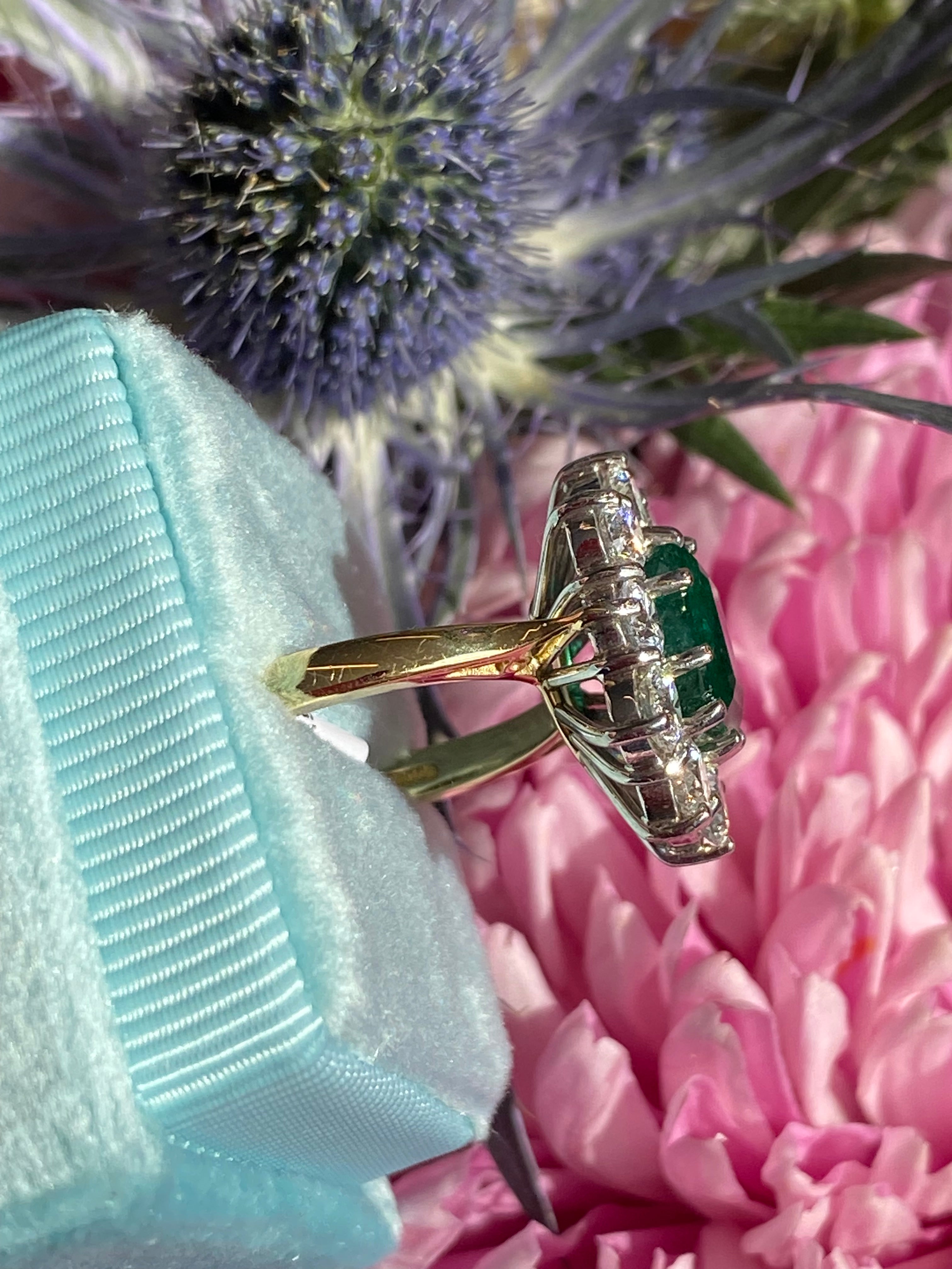 Outrageously Fantastic 4.17 CTW Emerald and Diamond Halo Ring in 18ct White and Yellow Gold