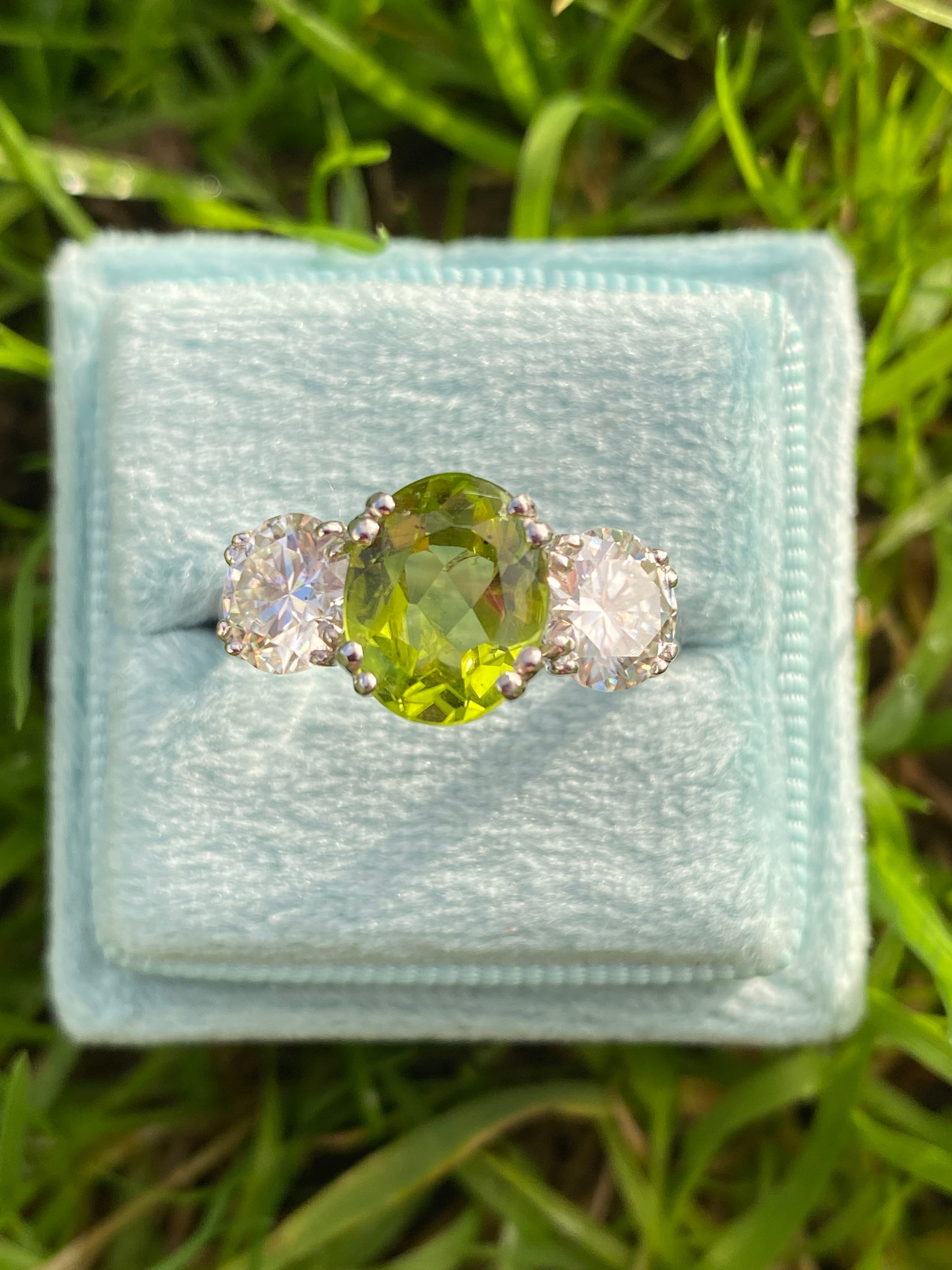 2.57 Carat Peridot and 1.84 Carat Moissanite Three Stone Ring in Sterling Silver