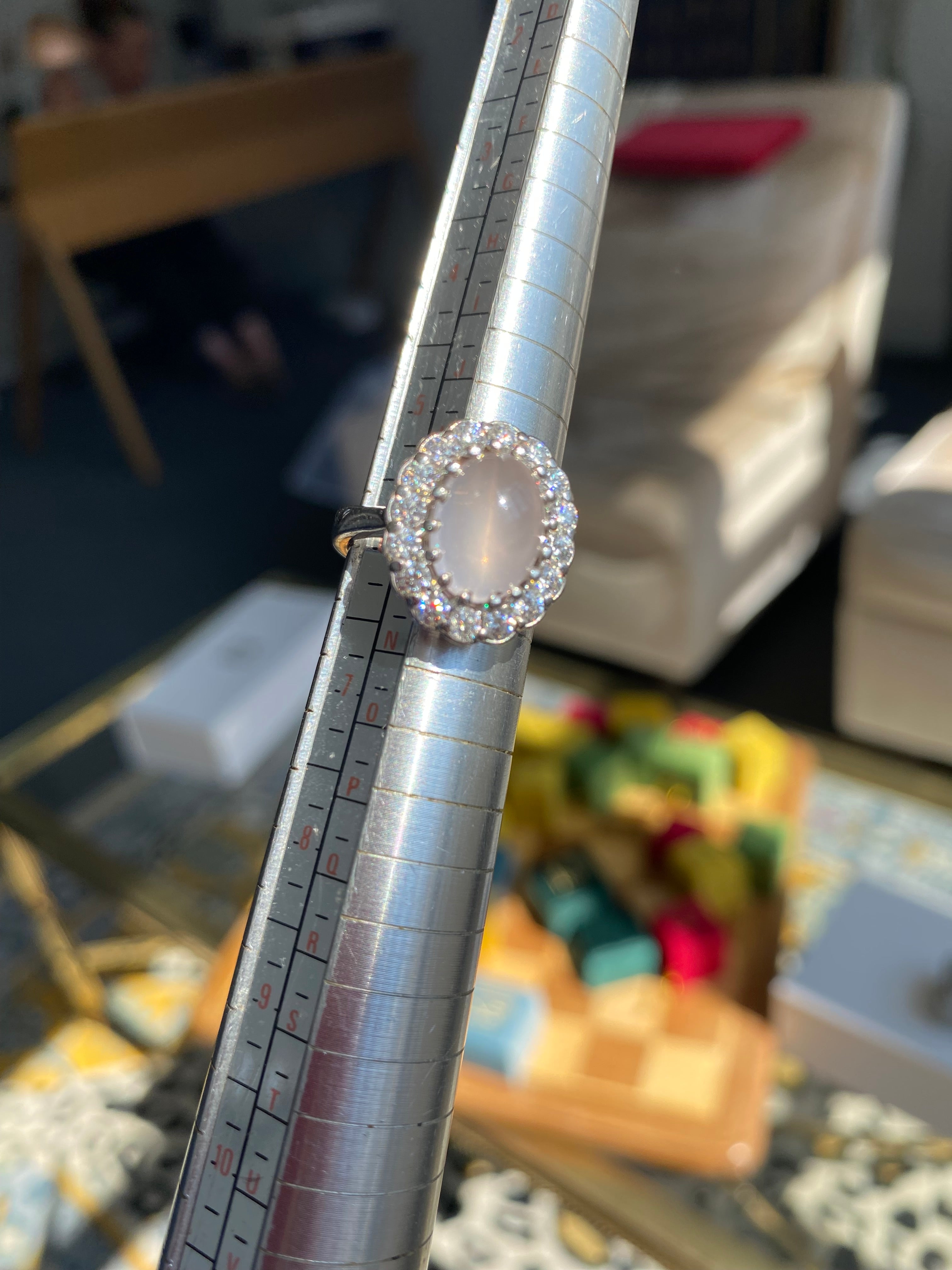 4.50 CTW Oval Cabochon Cut Rose Quartz and Moissanite Halo Cocktail Ring in Sterling Silver
