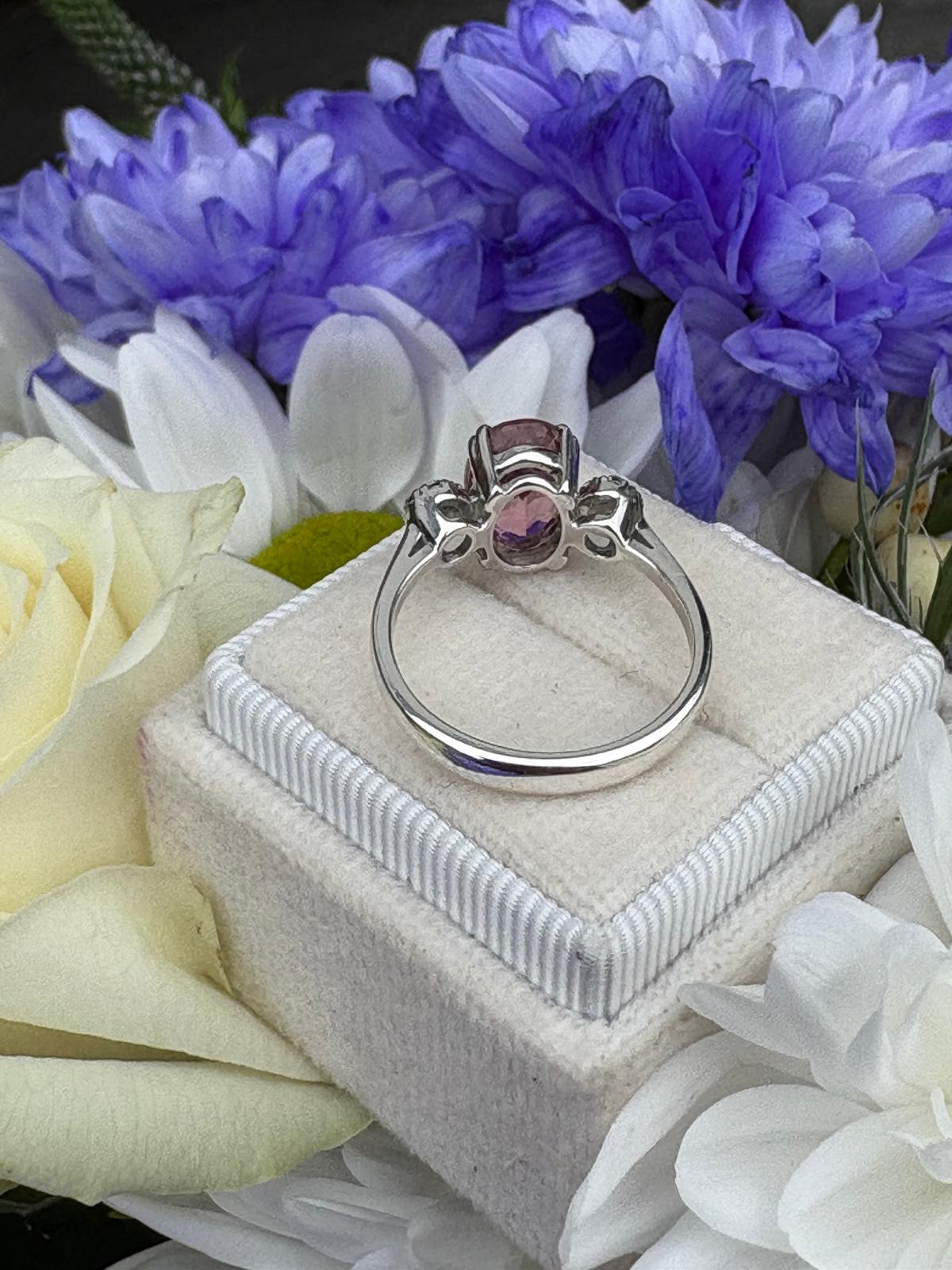 2.05 Carat Pink Tourmaline and Moissanite Three Stone Style Ring in Sterling Silver