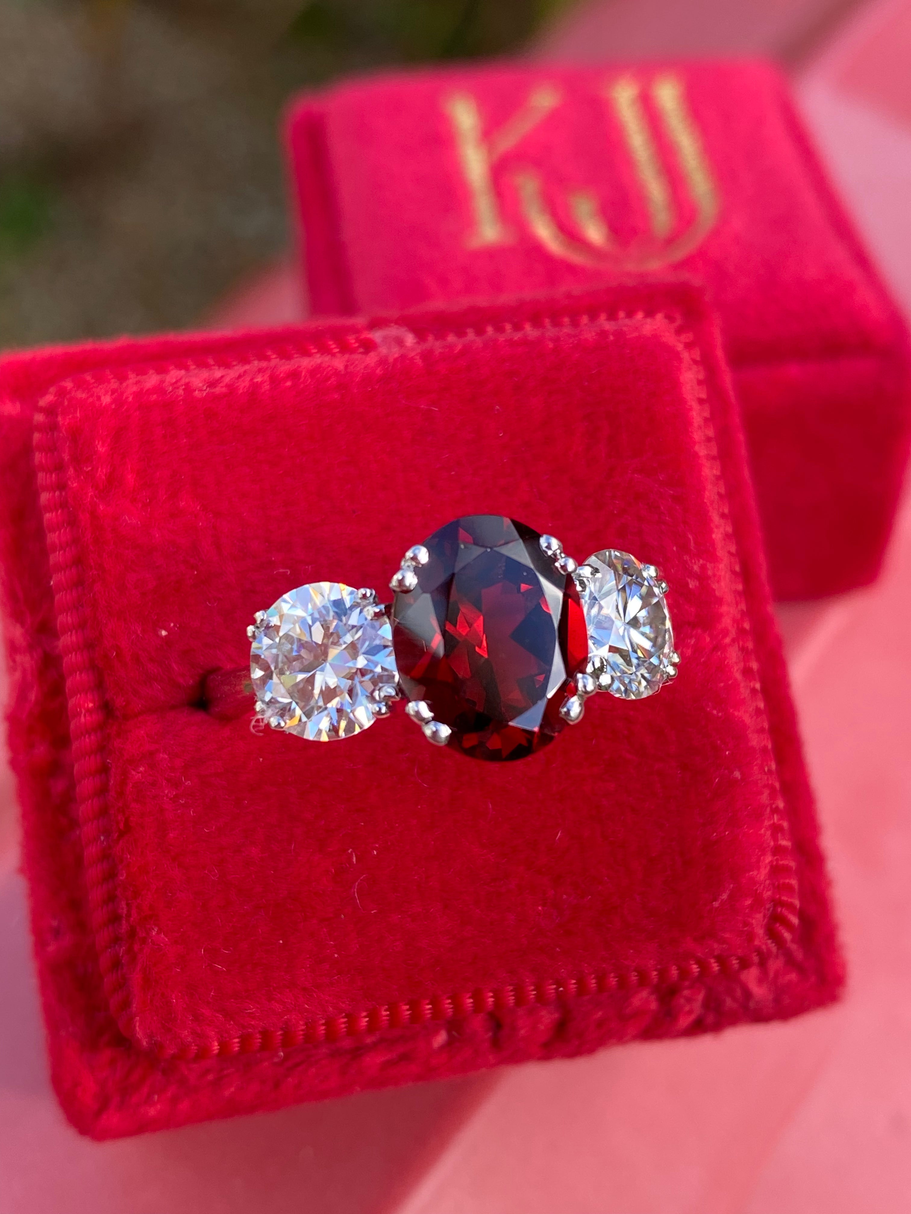 2.57 Carat Garnet and 1.84 Carat Moissanite Three Stone Ring in Sterling Silver