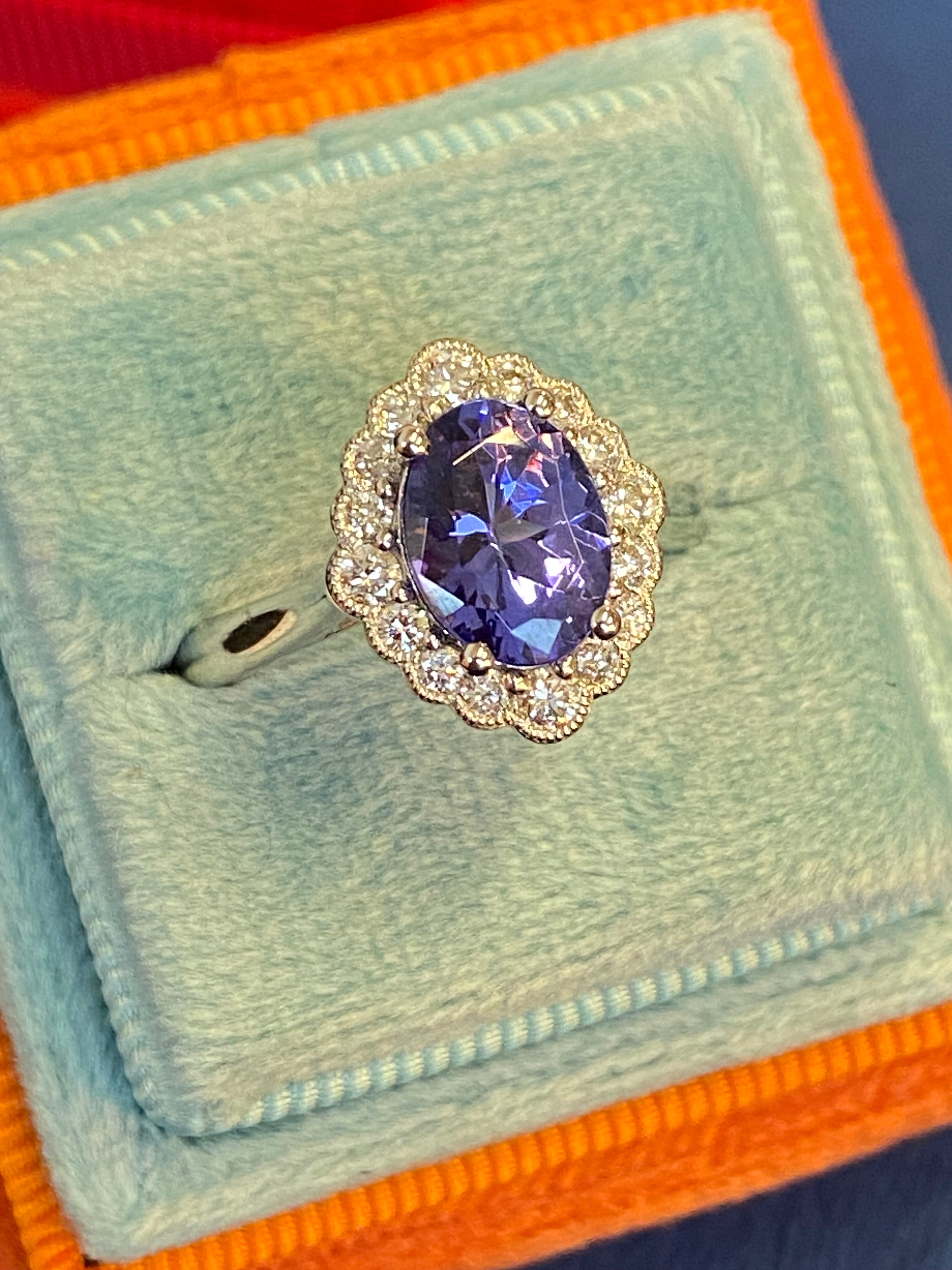 1.99 CTW Tanzanite and Natural Diamond Halo Ring in Platinum