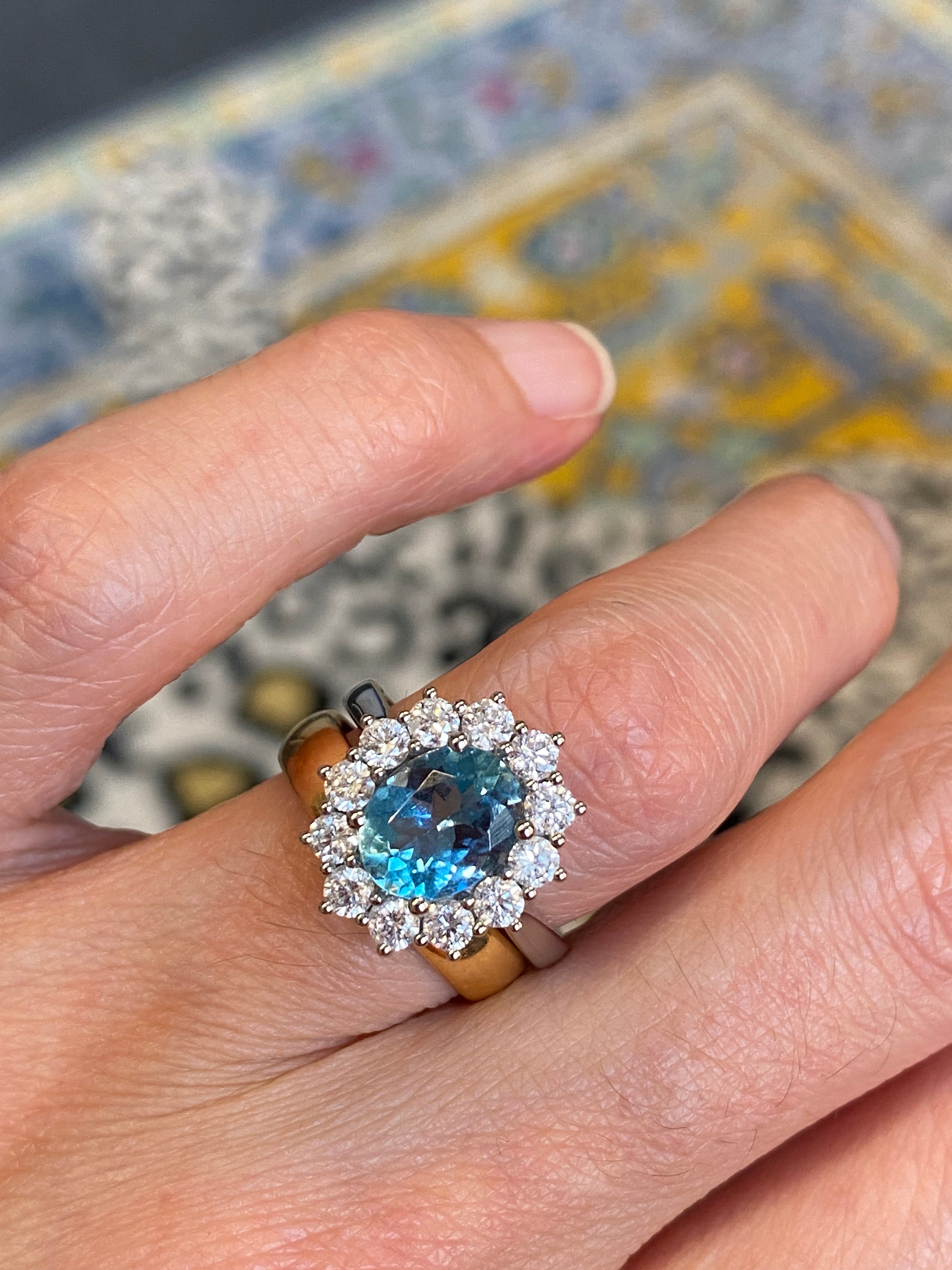 2.68 CTW Oval Cut Aquamarine and Natural Diamond Halo Engagement Ring in Platinum