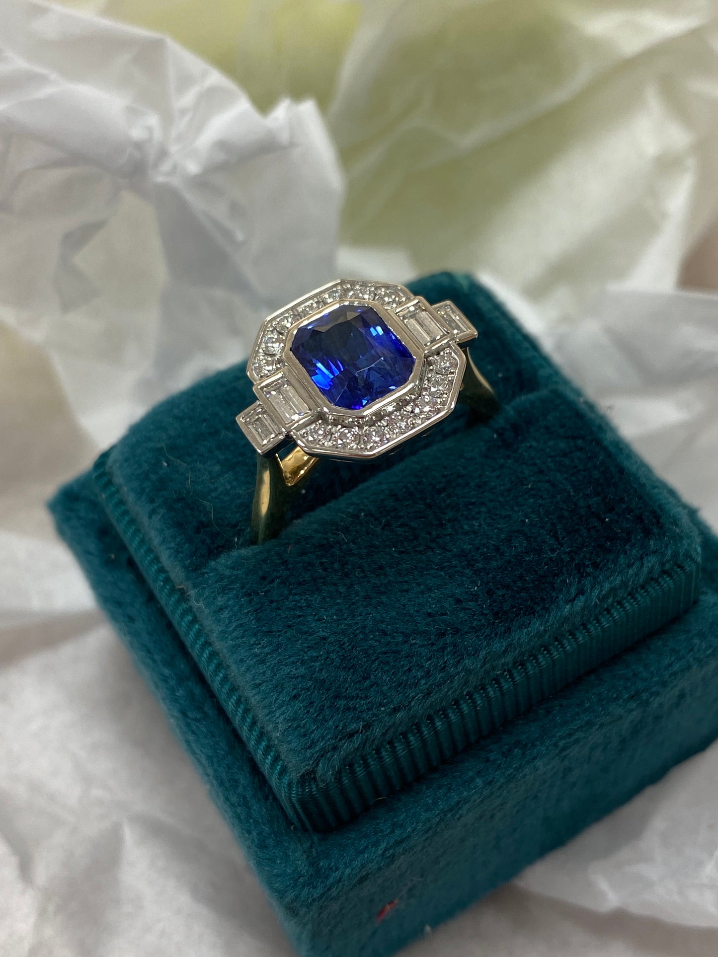 2.06 Carat Emerald Cut Sapphire and Natural Diamond Halo Ring in Platinum and 18ct Yellow Gold