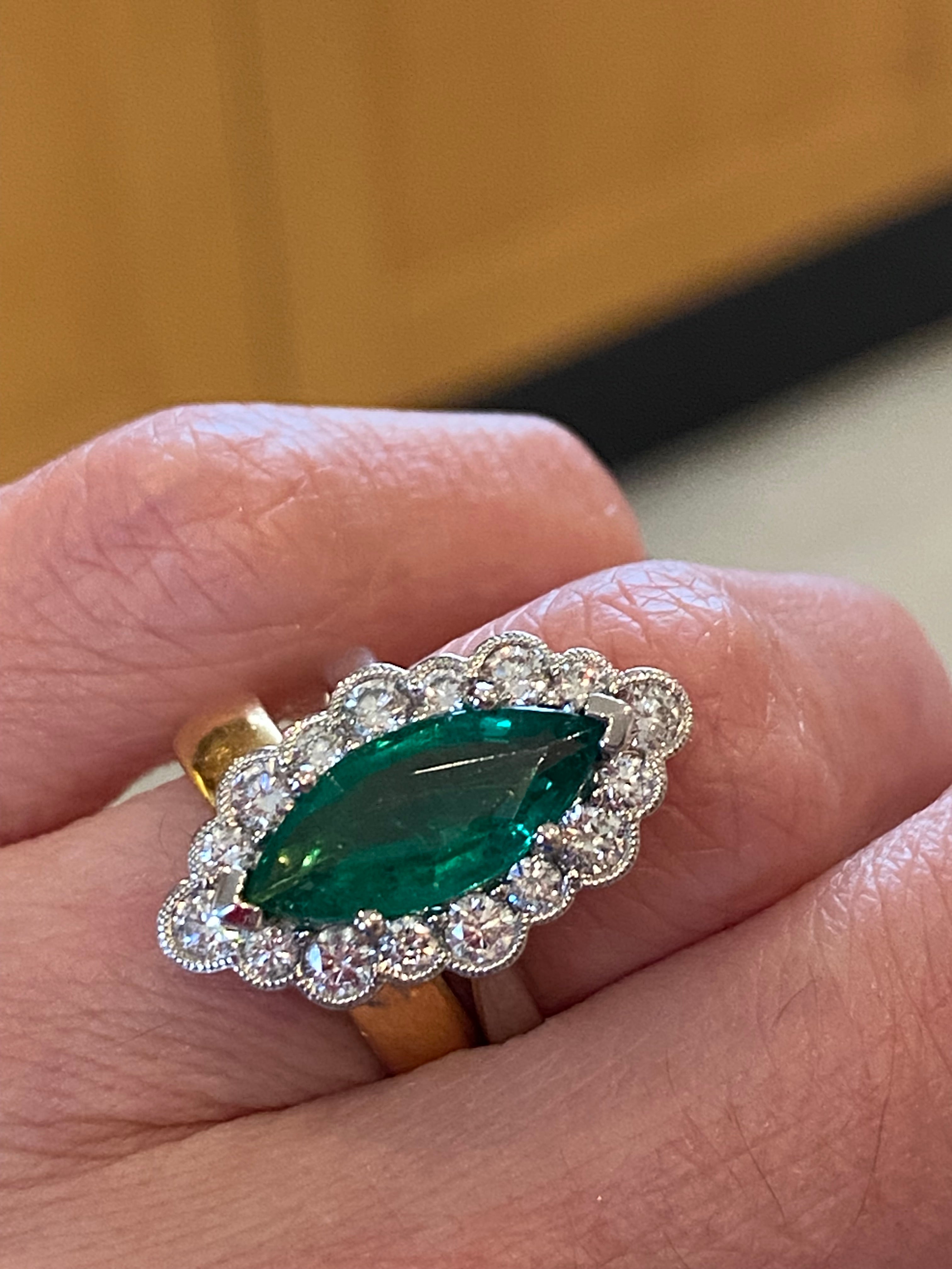 3.47 CTW Marquise Cut Emerald and Natural Diamond Halo Ring in Platinum