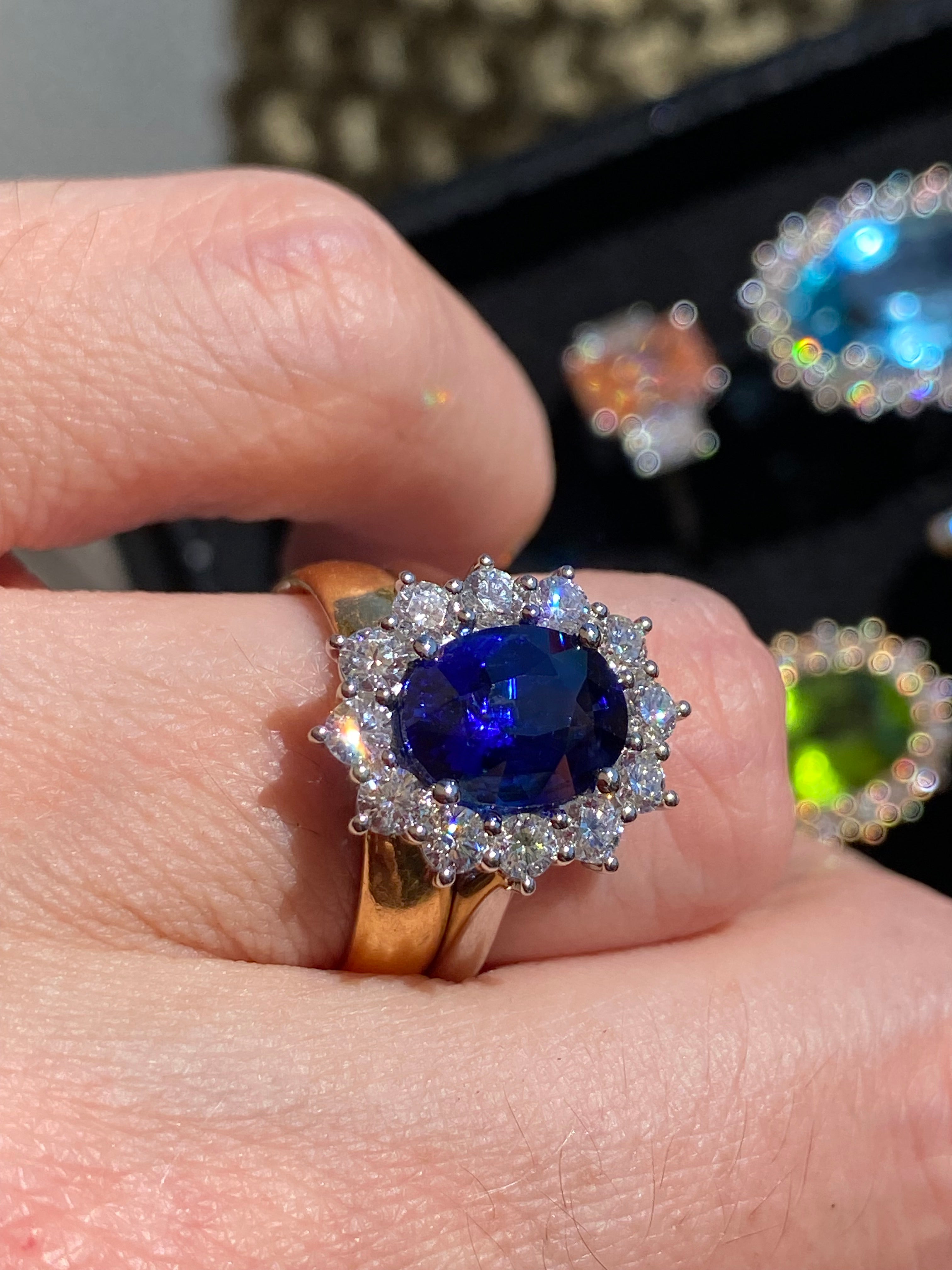 6.37 Carat Gubelin Certed Blue Ceylon Sapphire and 1.80 CTW Natural Diamond Halo Ring in Platinum