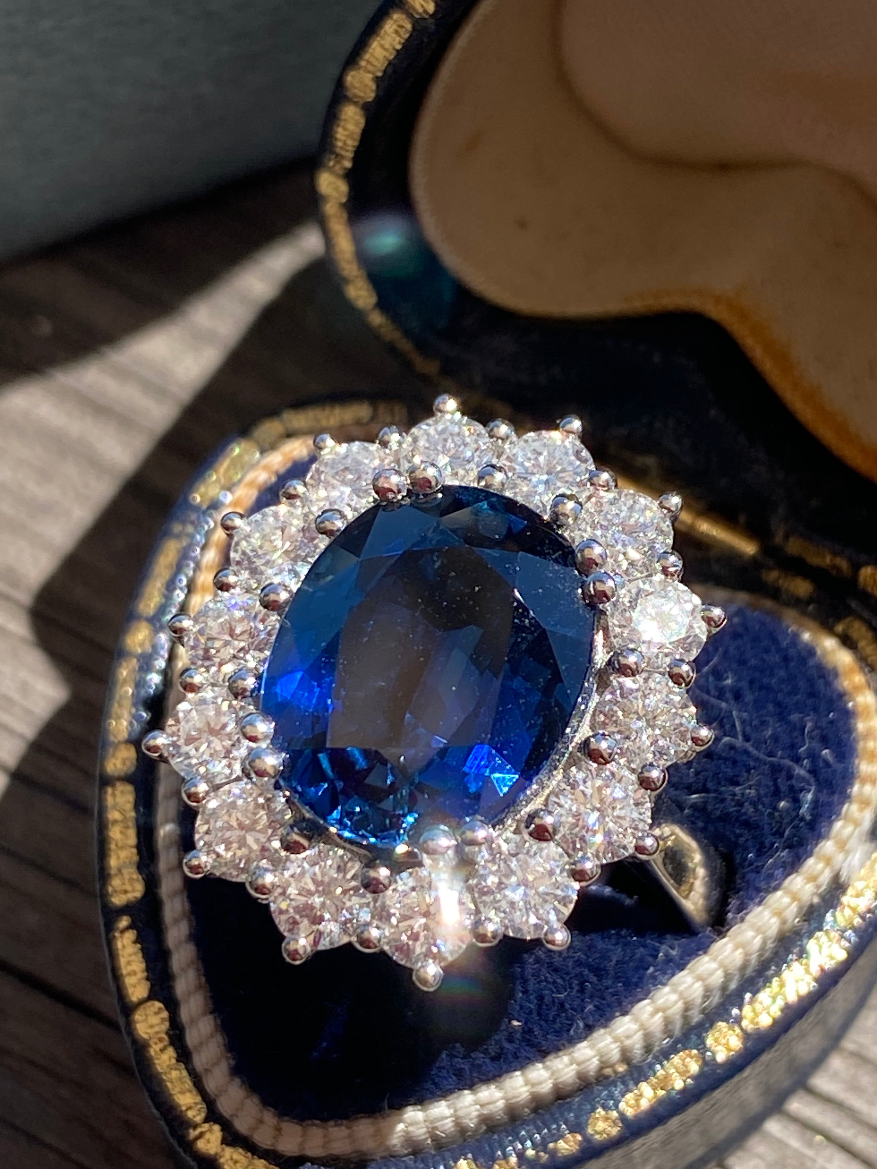 6.37 Carat Gubelin Certed No Heat Blue Ceylon Sapphire and 1.80 CTW Natural Diamond Halo Ring in Platinum