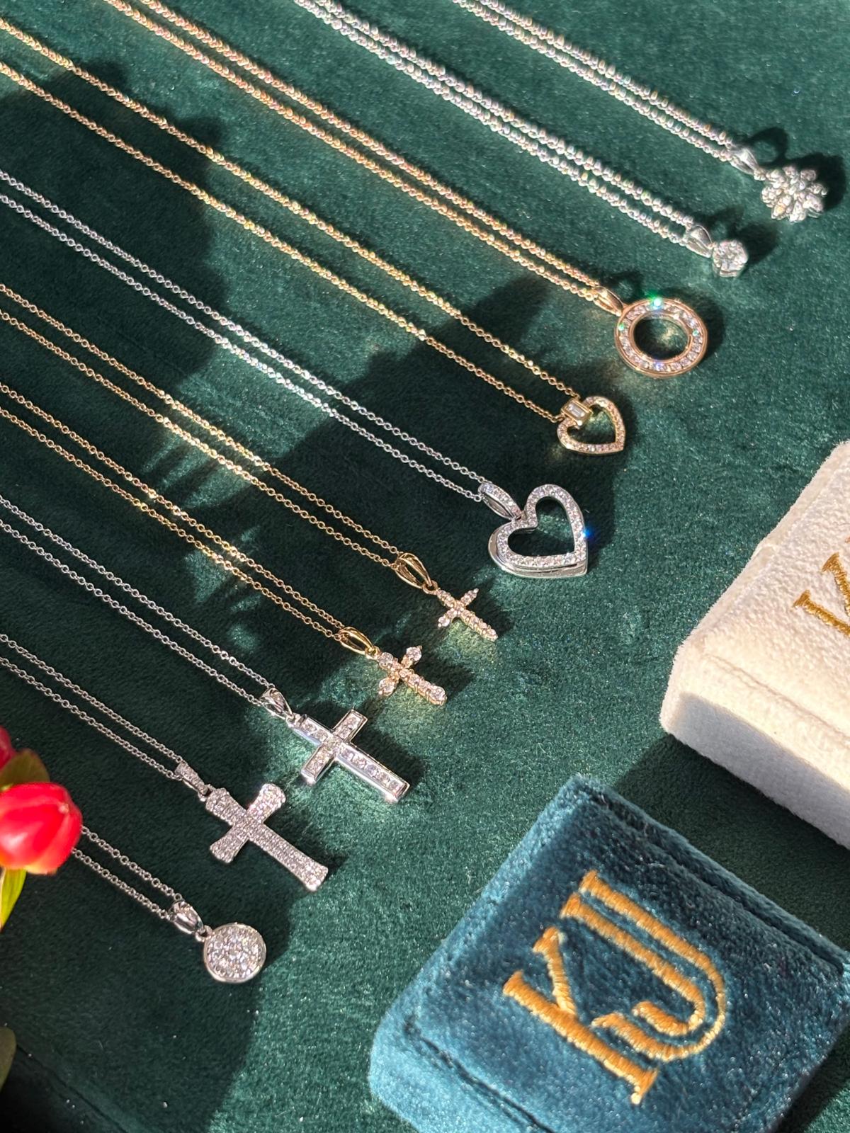 Pear Cut Ruby and Natural Diamond Pendant Necklace in 18ct White Gold