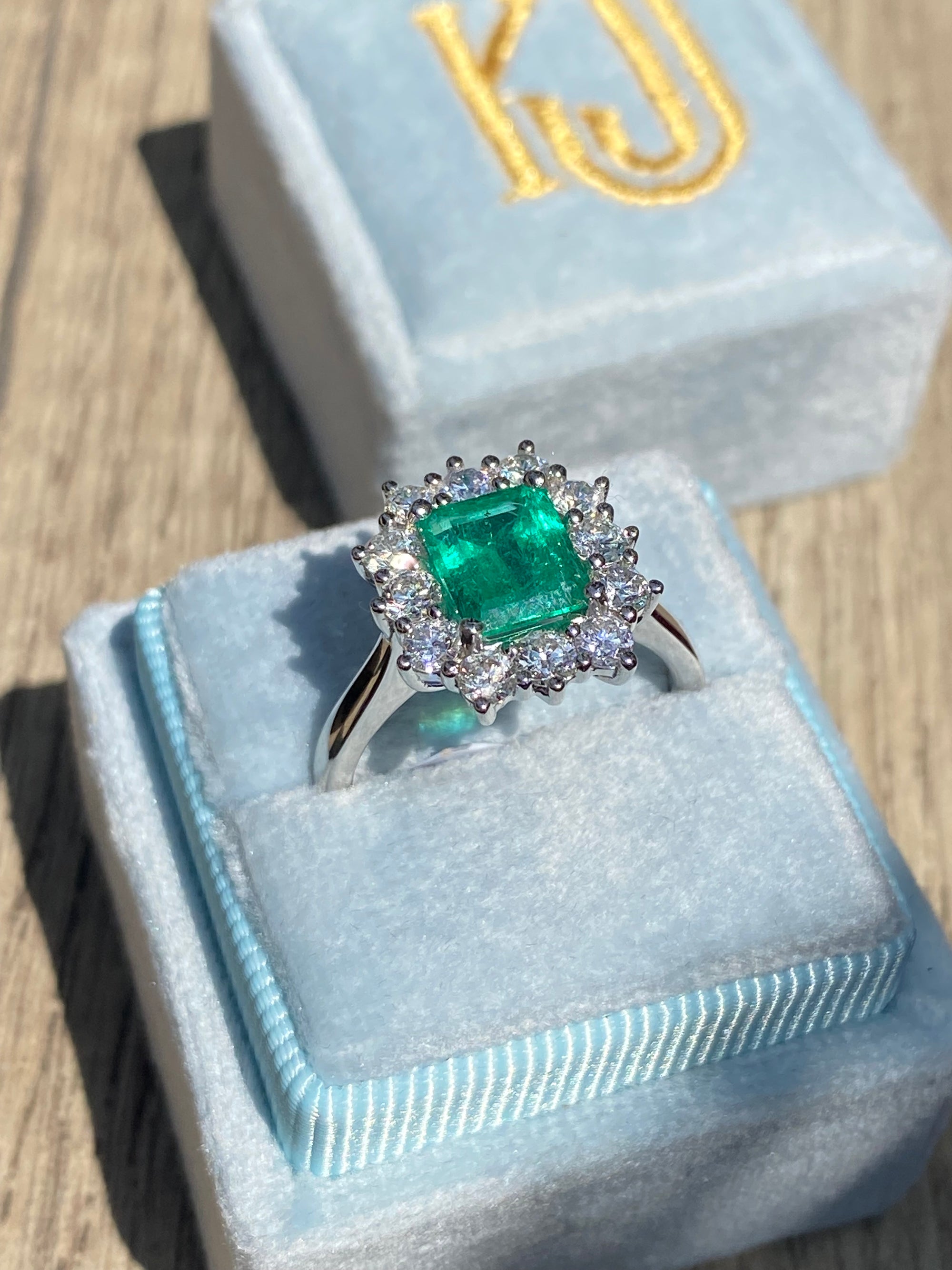 2.34 CTW Emerald Cut Colombian Emerald and Natural Diamond Halo Ring in Platinum