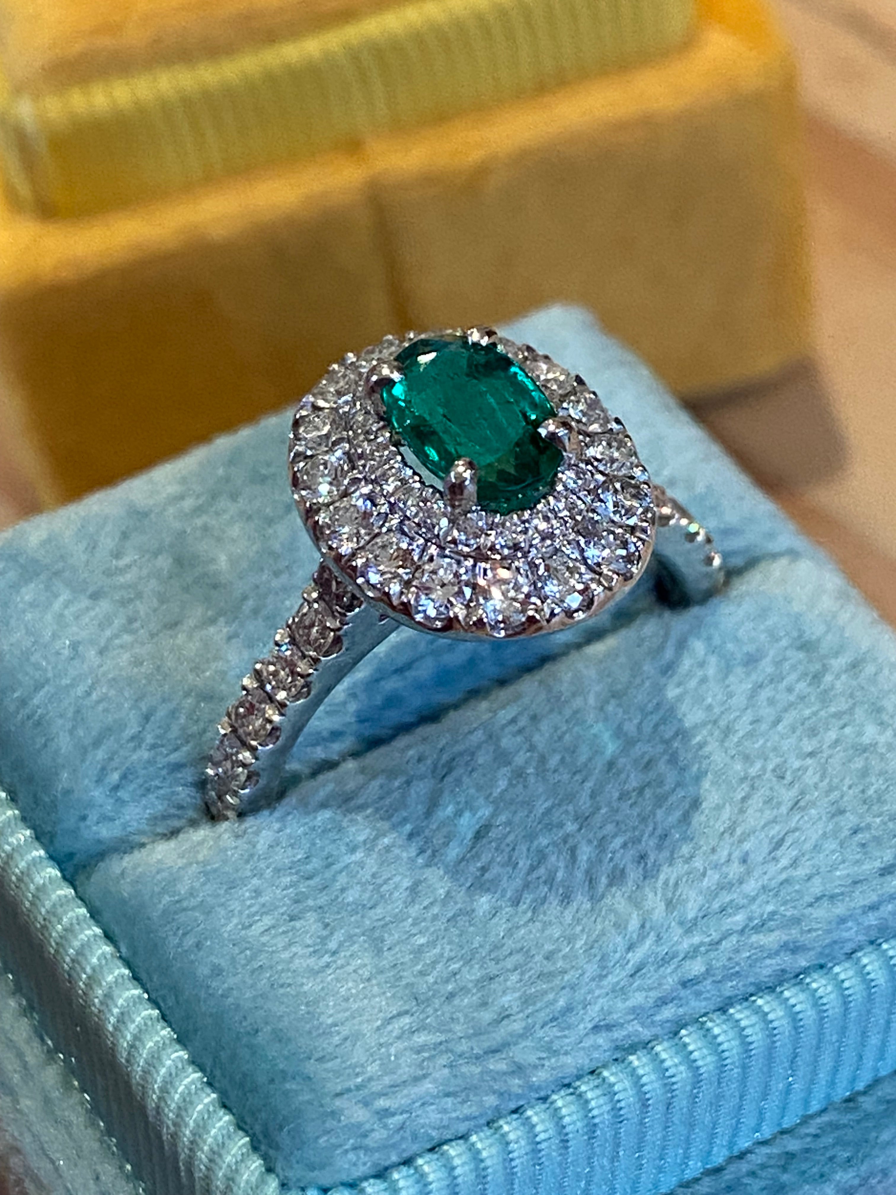 1.45 CTW Emerald and Natural Diamond Double Halo Ring in Platinum